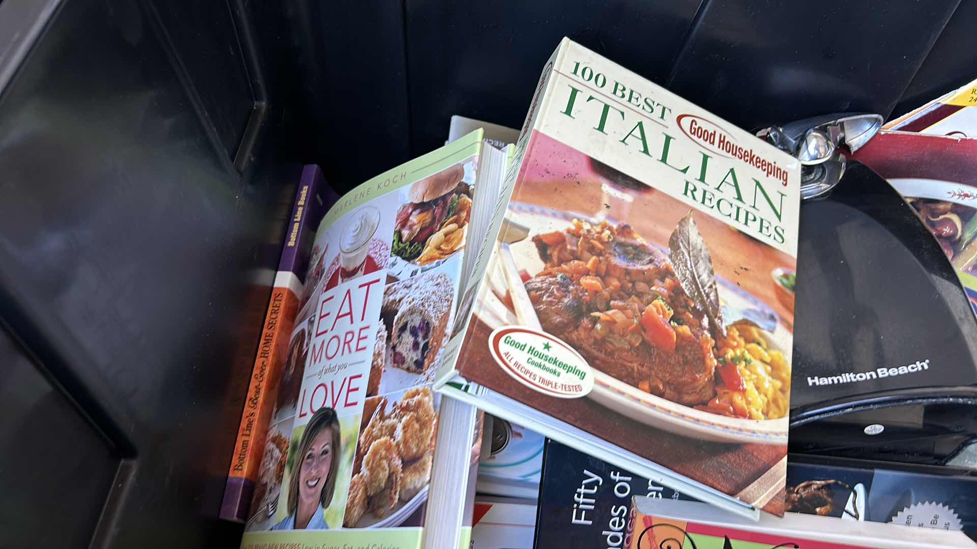 Photo 4 of LARGE TOTE FULL OF RECIPE BOOKS AND ONE CAN OPENER.