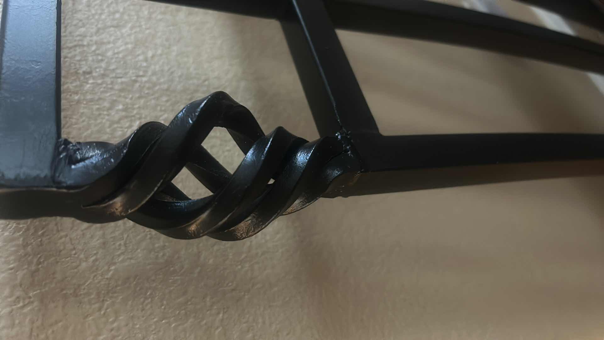 Photo 5 of HEAVY BLACK WROUGHT IRON CHAIR WITH THICK UPHOLSTERED PADDING.