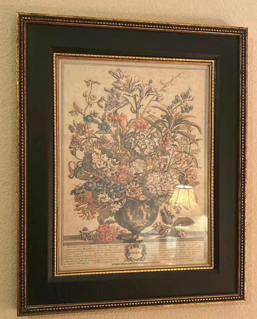 Photo 1 of GOLD-FRAMED JULY FLORAL ARTWORK, 17.5” X H 21.5”.