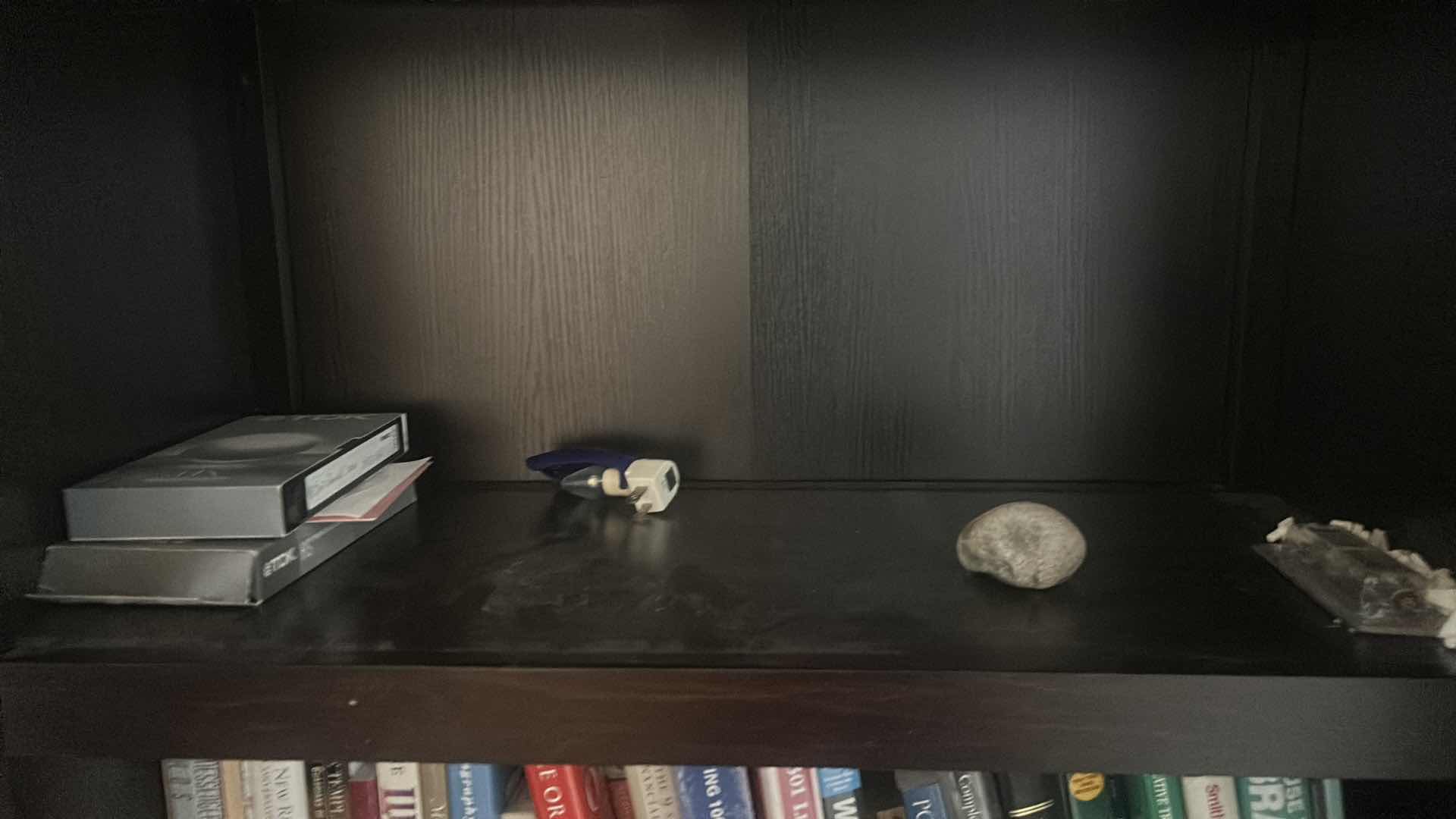 Photo 1 of HARD AND SOFT COVERED BOOKS AND MORE ON BOOKSHELF