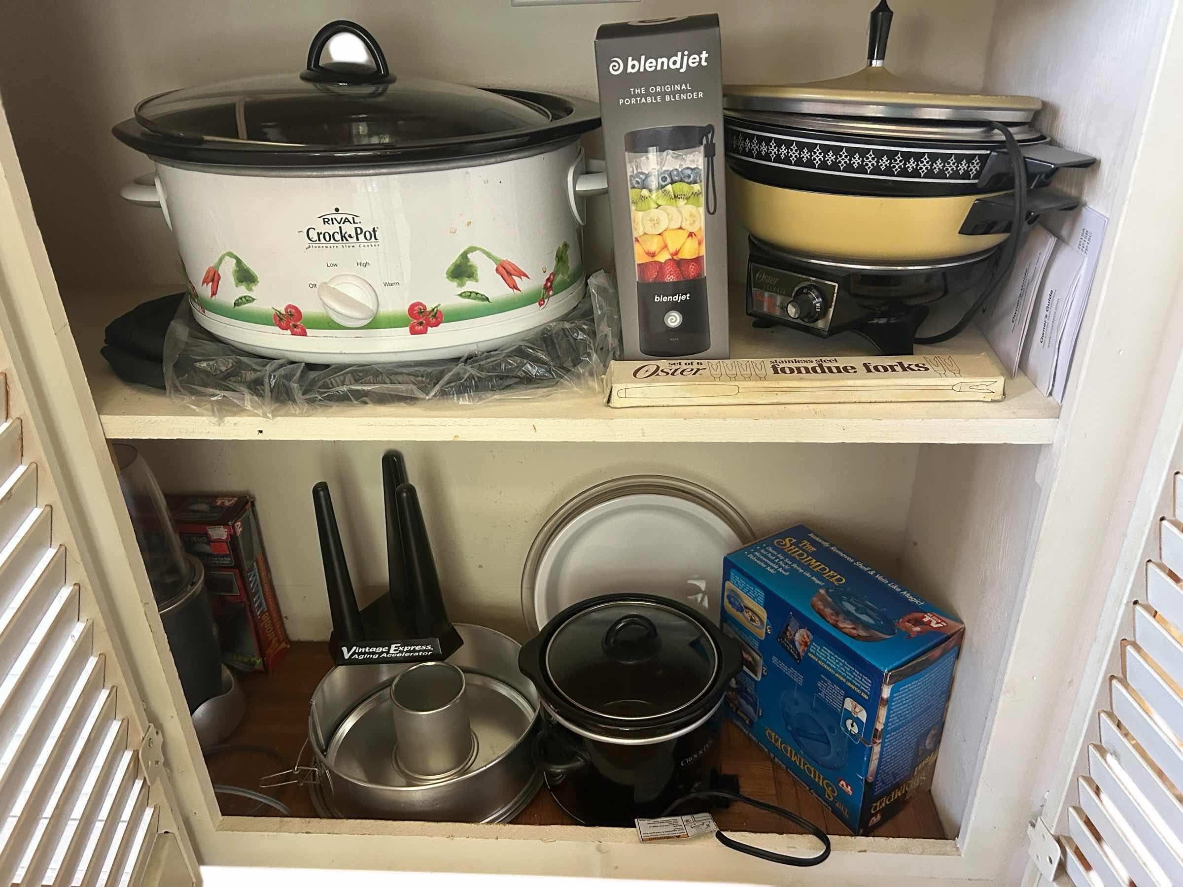 Photo 1 of CONTENTS ON 2 SHELVES - KITCHEN ISLAND- CROCKPOTS, SKILLET, BUNDT CAKE PAN AND MORE