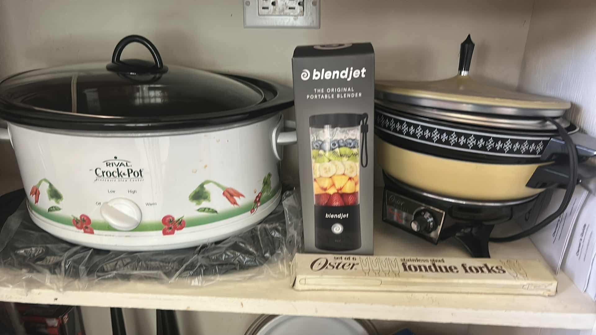 Photo 1 of CONTENTS ON 2 SHELVES - KITCHEN ISLAND- CROCKPOTS, SKILLET, BUNDT CAKE PAN AND MORE