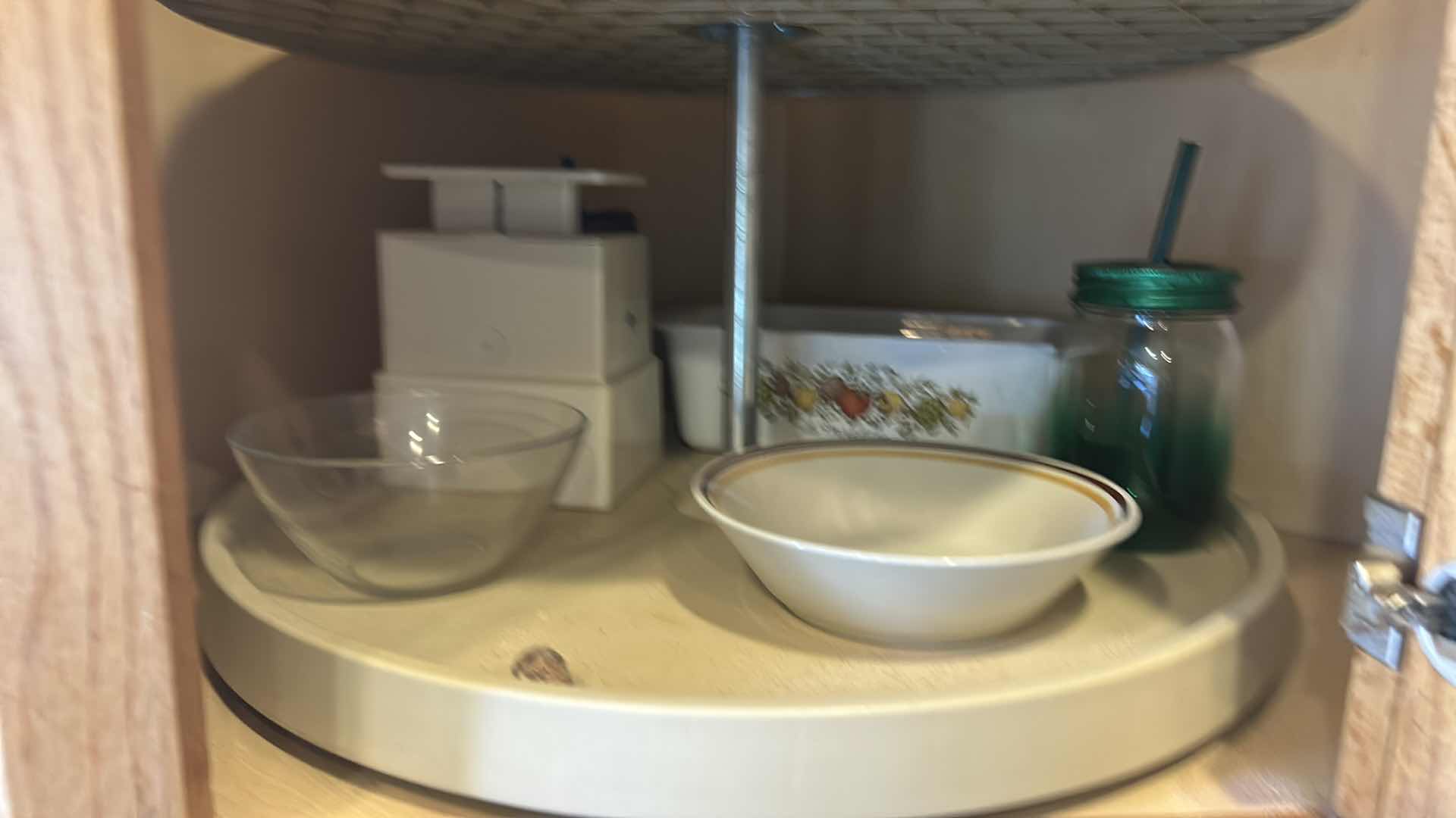 Photo 1 of CONTENTS OF CORNER CABINET IN KITCHEN- CORNING WARE, FOOD SCALE & MORE