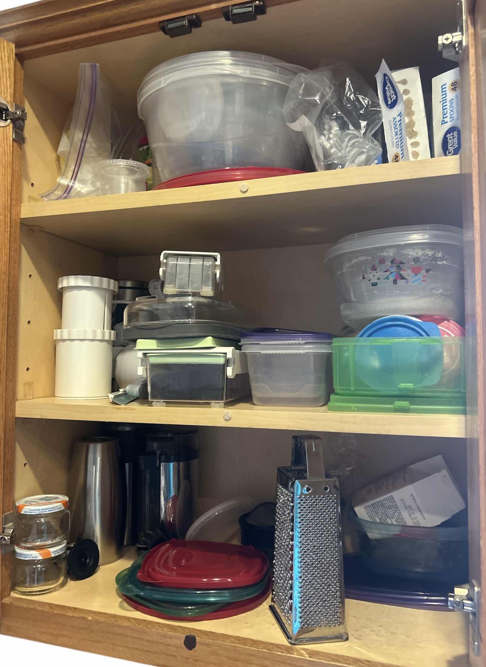 Photo 1 of CONTENTS OF KITCHEN CABINET