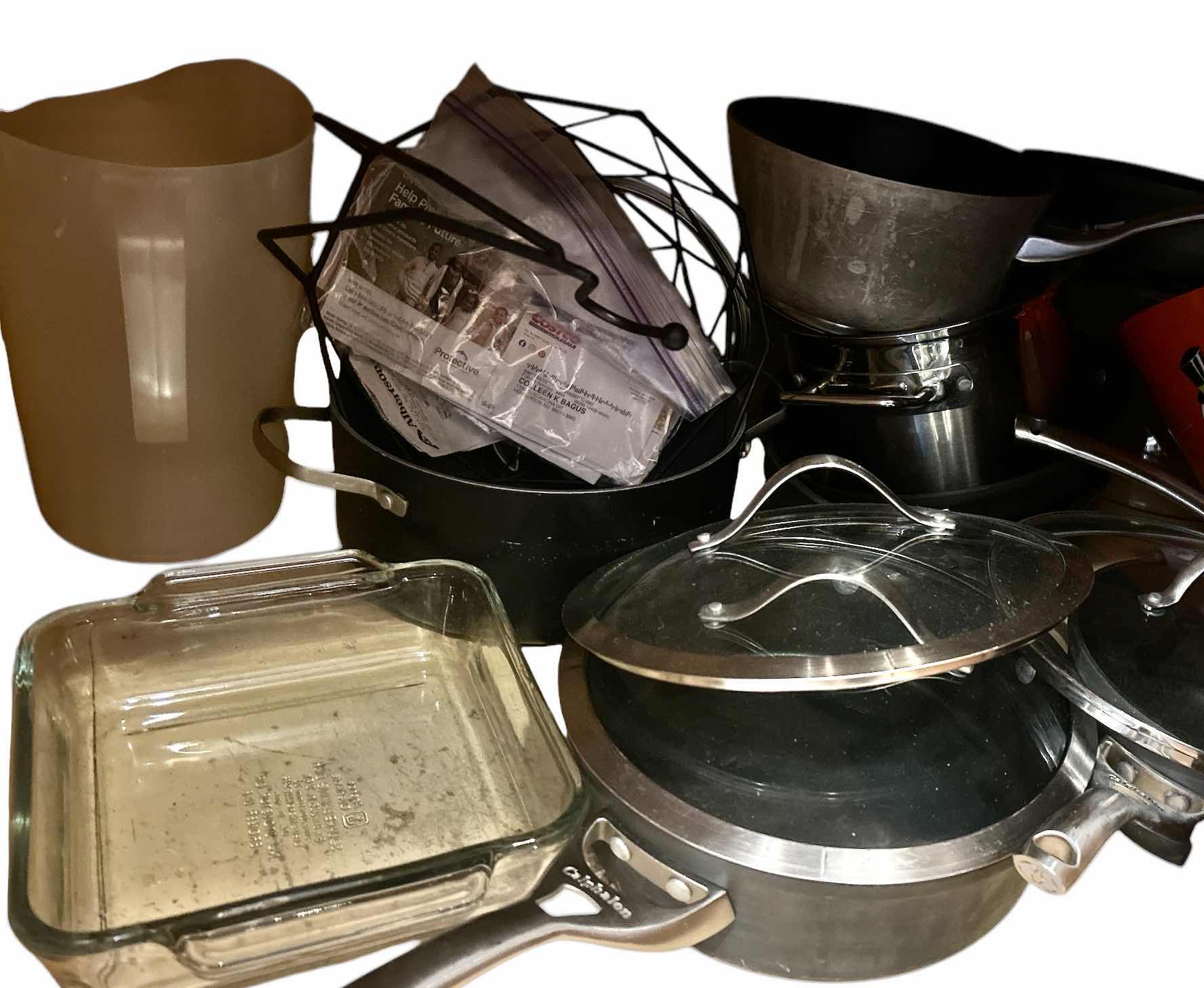 Photo 1 of CONTENTS OF KITCHEN CABINET