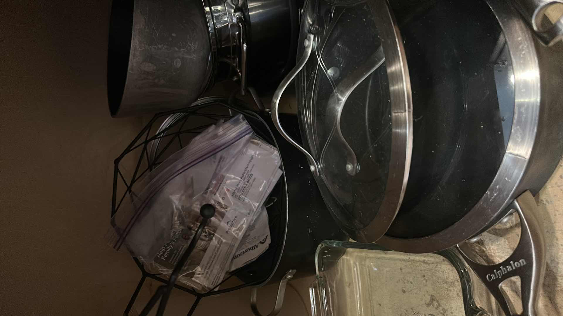 Photo 1 of CONTENTS OF KITCHEN CABINET