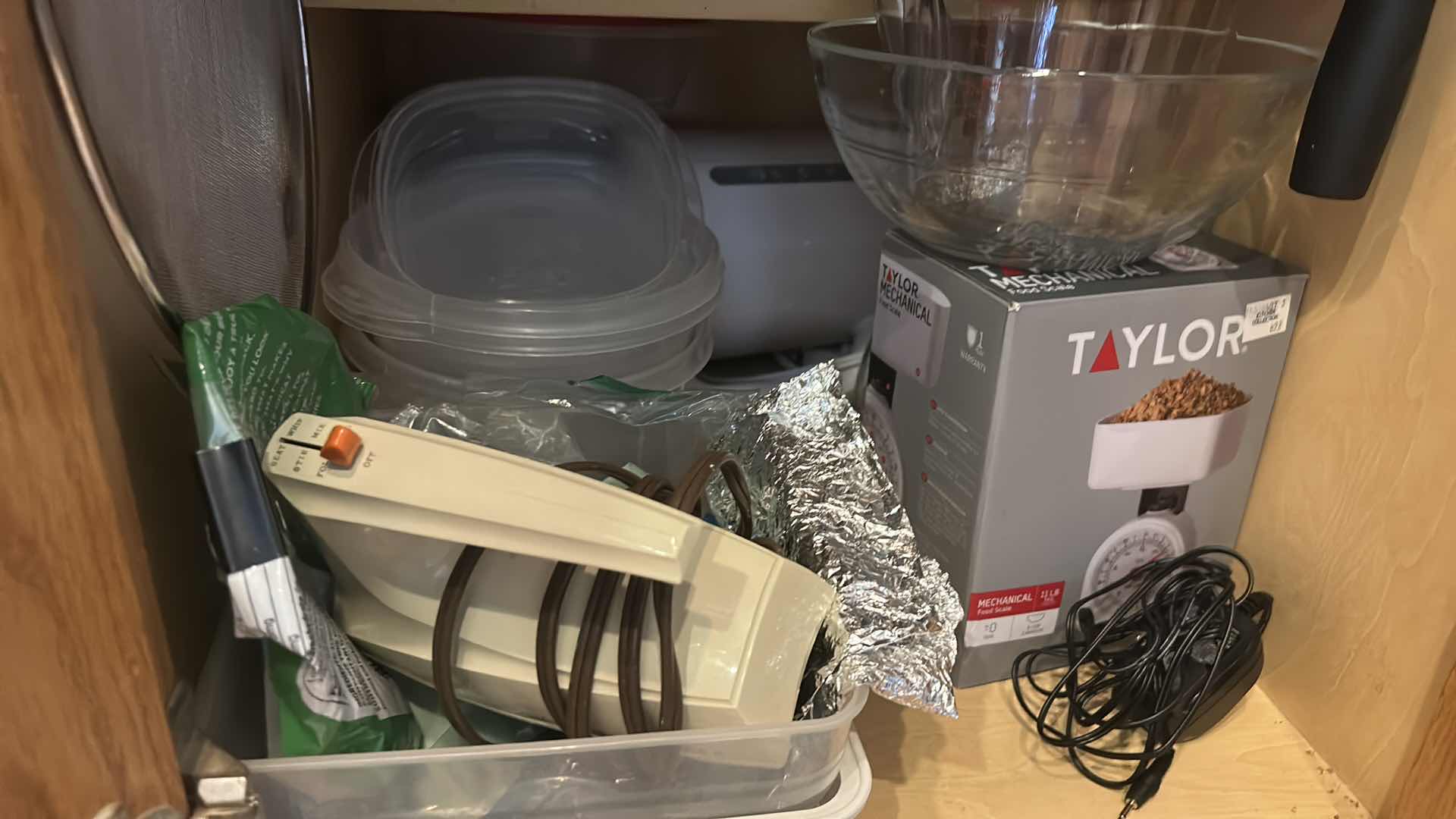 Photo 1 of CONTENTS OF KITCHEN CABINET