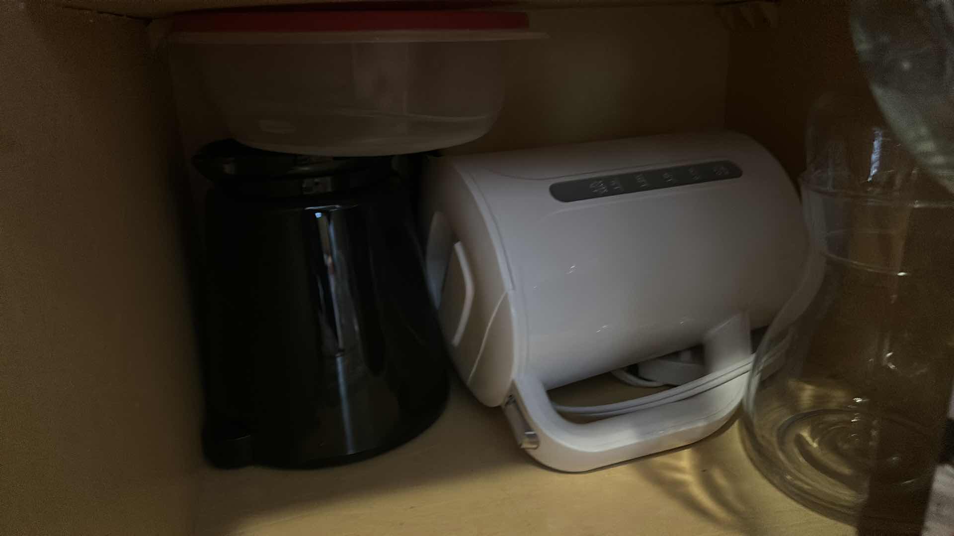 Photo 1 of CONTENTS OF KITCHEN CABINET
