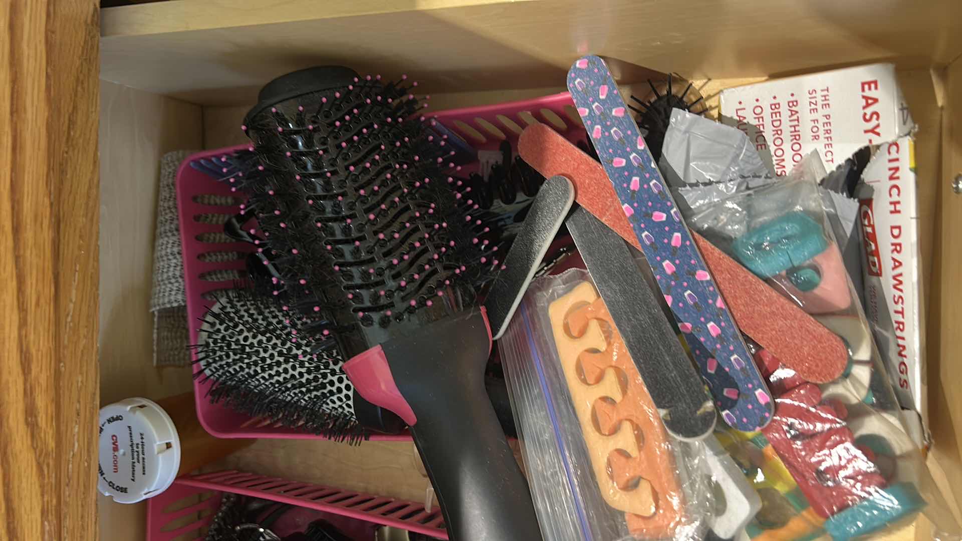 Photo 1 of CONTENTS OF DRAWER IN PRIMARY BATHROOM- HAIR CARE AND MORE