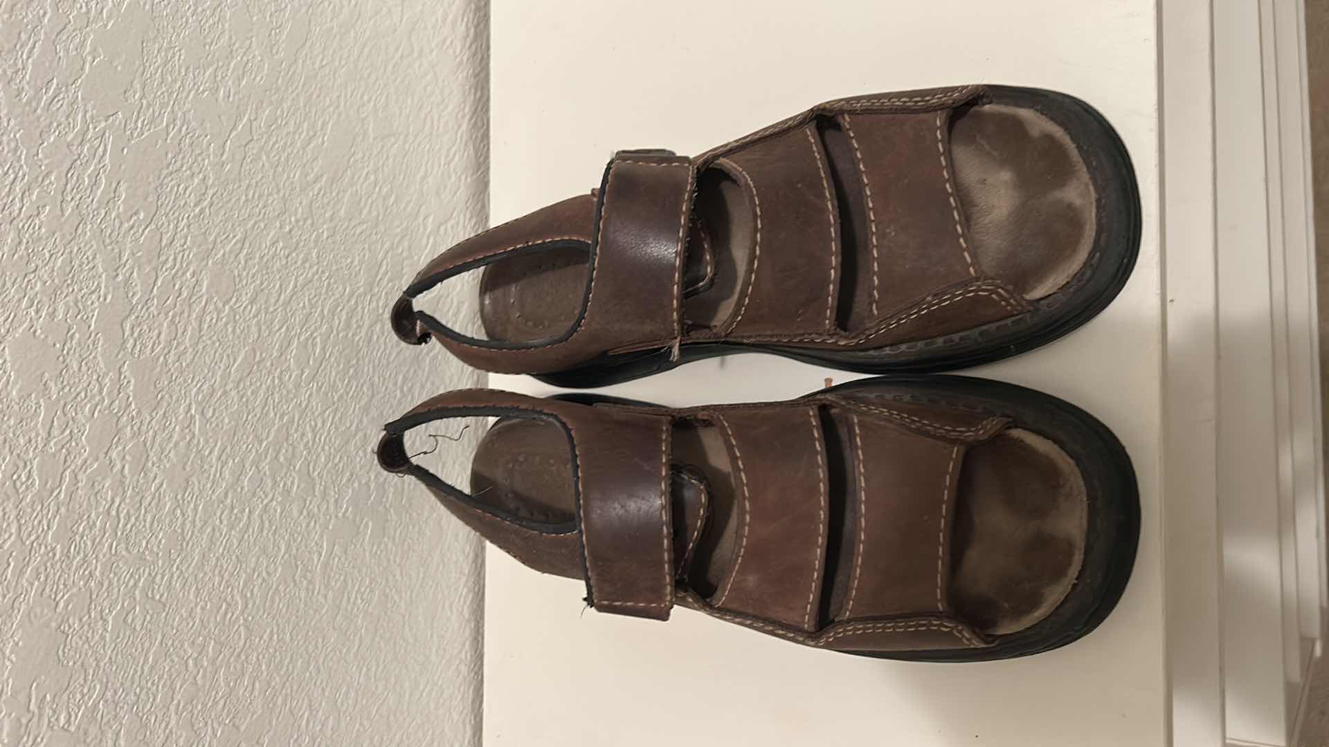 Photo 1 of HANGING SHOE RACK + 1 NEW IN BAG AND 9 PAIRS WOMENS SHOES SIZE 7.5