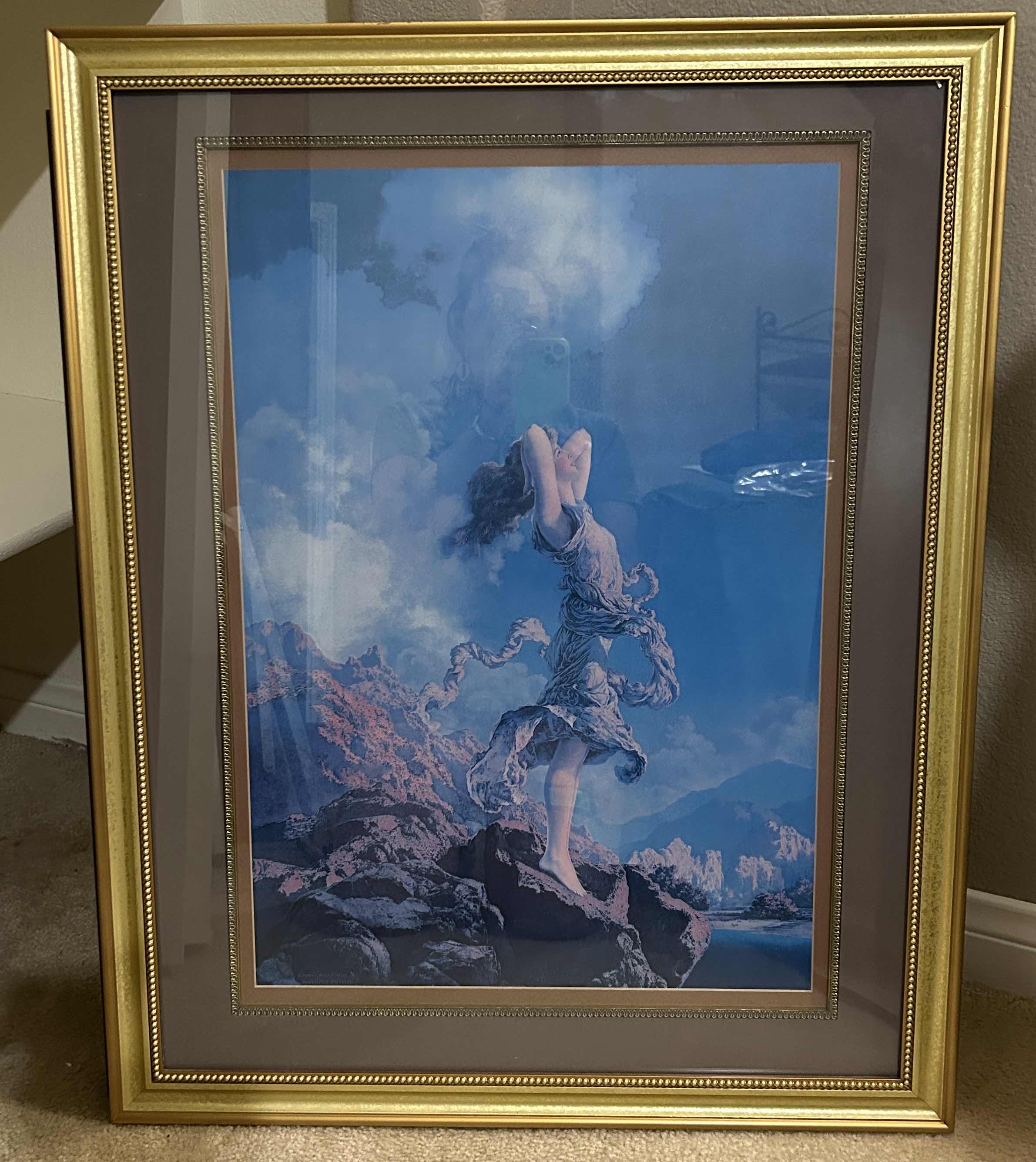 Photo 1 of GOLD FRAMED, YOUNG WOMAN ON JAGGED ROCKS LOOKING UP AT SKY ARTWORK 24 1/2” x H30 1/2”