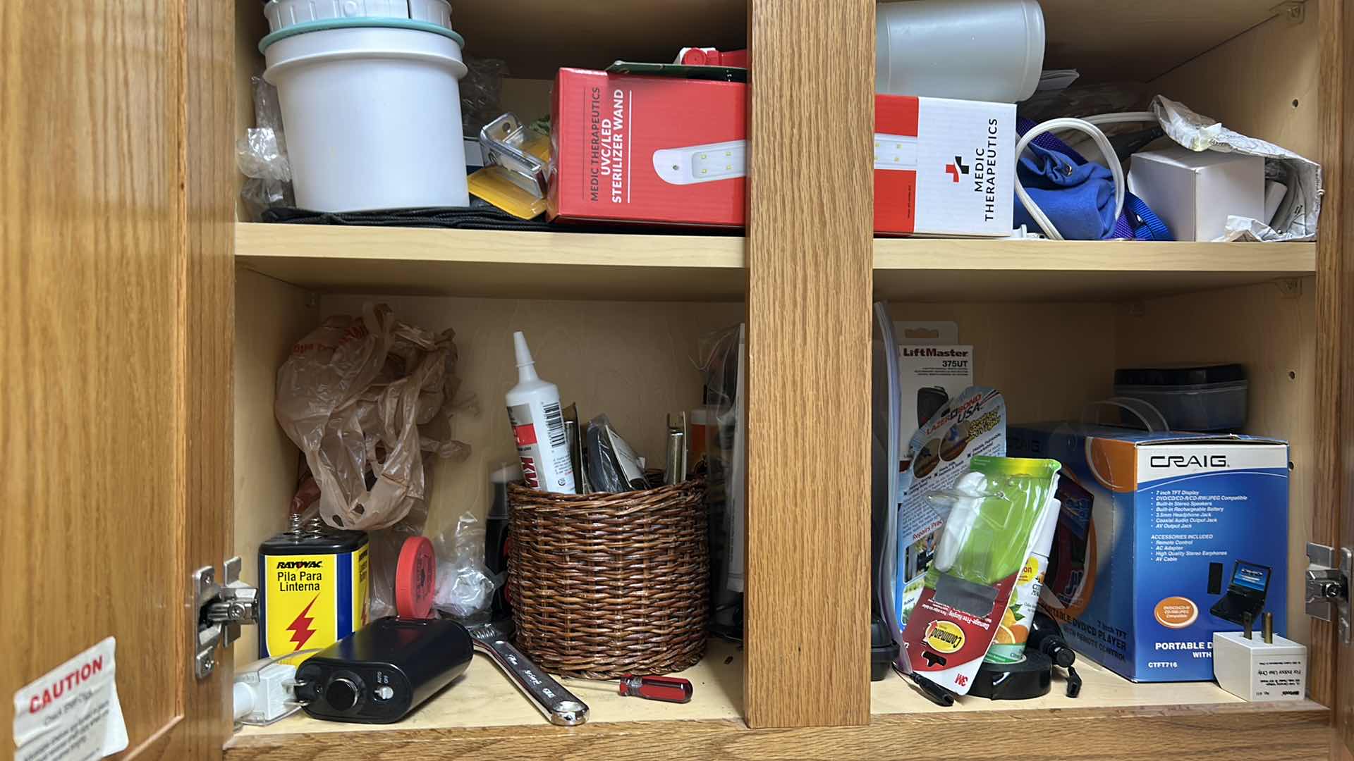 Photo 1 of CONTENTS OF CABINET LAUNDRY