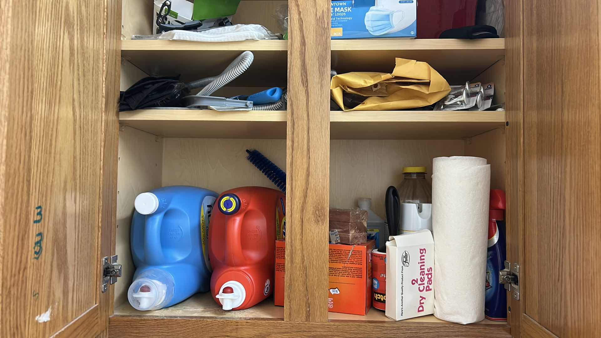Photo 1 of CONTENTS OF CABINET LAUNDRY