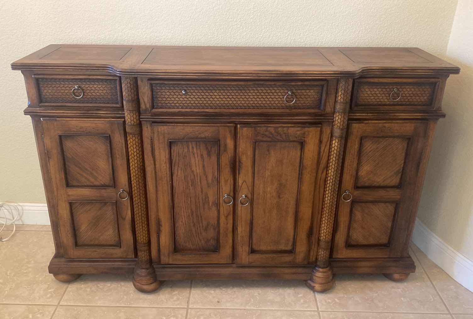 Photo 1 of ASHLEY FURNITURE OAK BUFFET WITH WOOD BRAID DESIGN & DOVETAIL DRAWERS 59” x 17” H36”