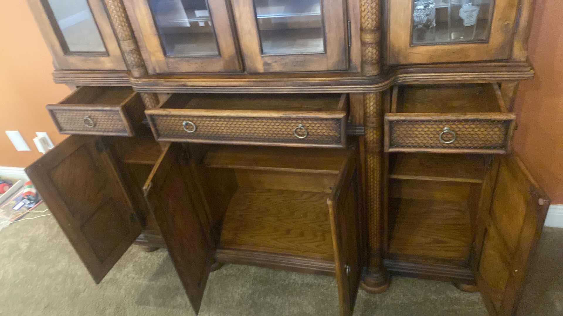 Photo 6 of ASHLEY FURNITURE WOOD CHINA DISPLAY WITH WOOD BRAID ACCENTS AND DOVETAIL DRAWERS 62” x 17” H81” (contents not included)