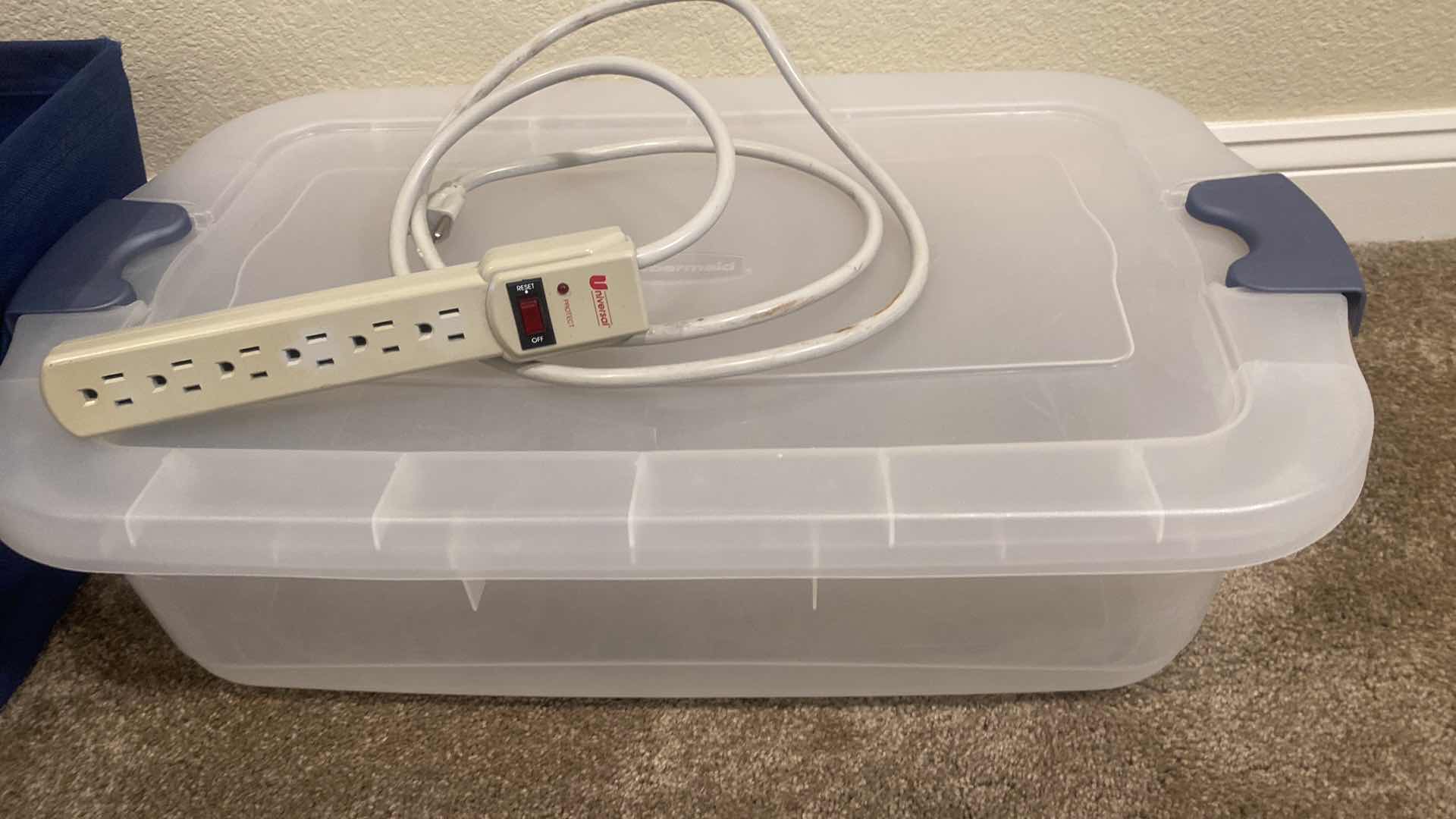 Photo 2 of PLASTIC TOTE WITH LID, CLOTH BASKET & SURGE PROTECTOR