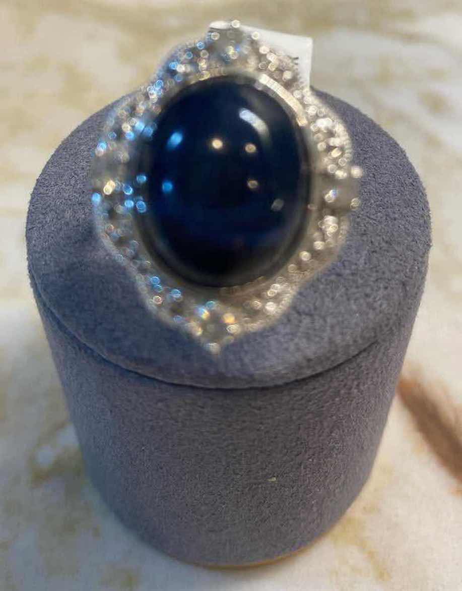 Photo 1 of 925 STERLING SILVER RING 7.9 gm WITH STAR SAPPHIRE CORUNDUM EST 15.25 ctw W/NATURAL DIAMOND ROUND BRILLIANT CUT EST .34 ctw SIZE 7 GGA CERTIFIED APPRAISAL K57E7