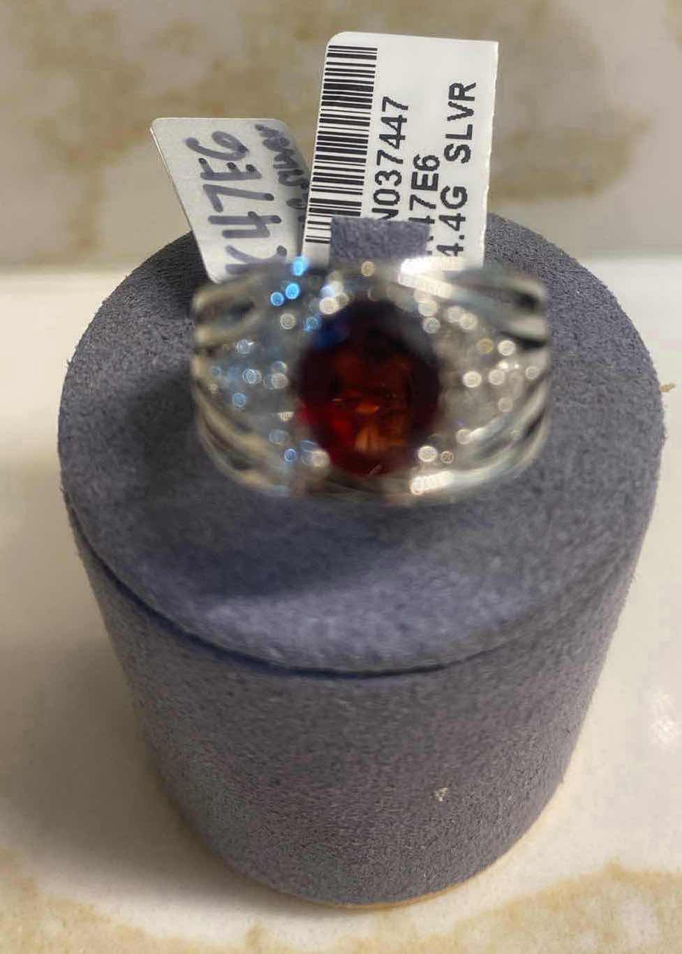 Photo 1 of 925 STERLING SILVER RING 4.6 gm W/ GARNET EST 2.05 ctw  OVAL W/NATURAL DIAMOND ROUND  EST .54 ctw SIZE 6.5 GGA CERTIFIED APPRAISAL K47E6