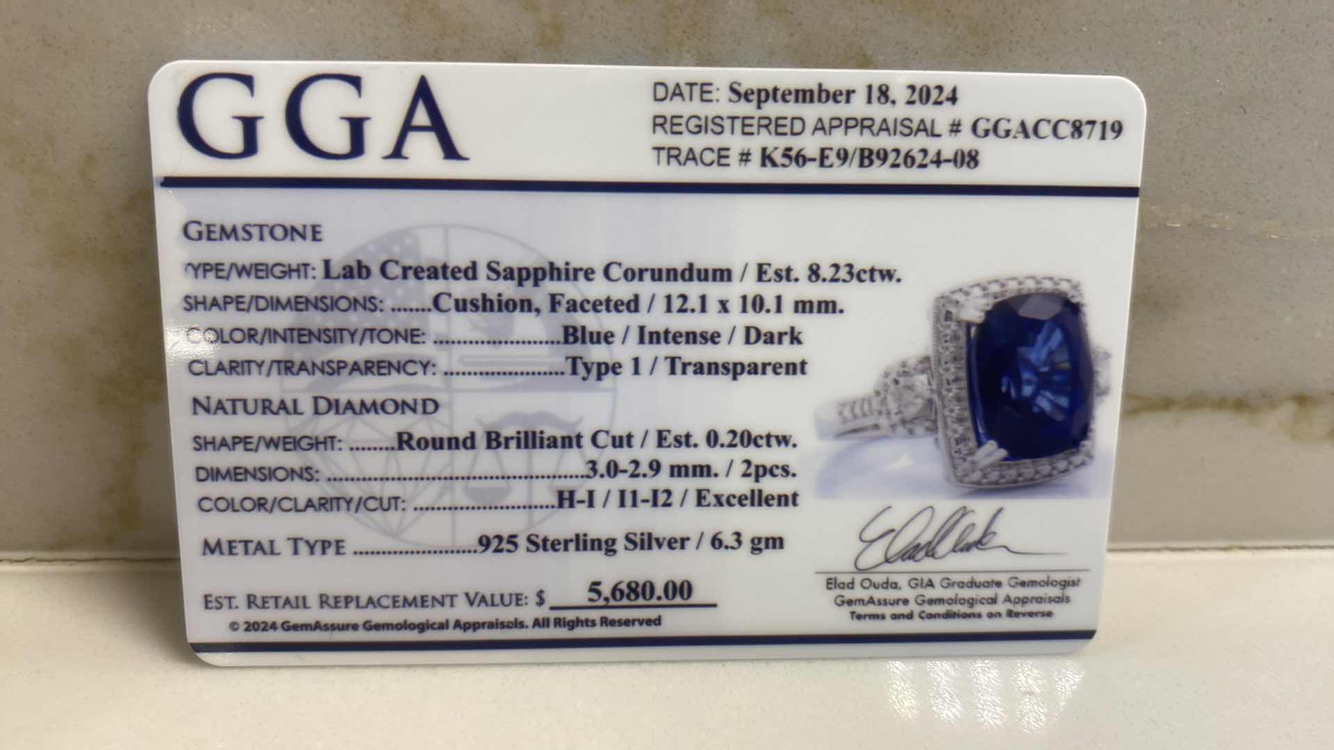 Photo 6 of 925 STERLING SILVER RING 6.3 gm W/ LAB CREATED SAPPHIRE CORUNDUM EST 8.23 ctw  CUSHION CUT W/NATURAL DIAMOND ROUND  EST .20 ctw SIZE 6.75 GGA CERTIFIED APPRAISAL K56E9