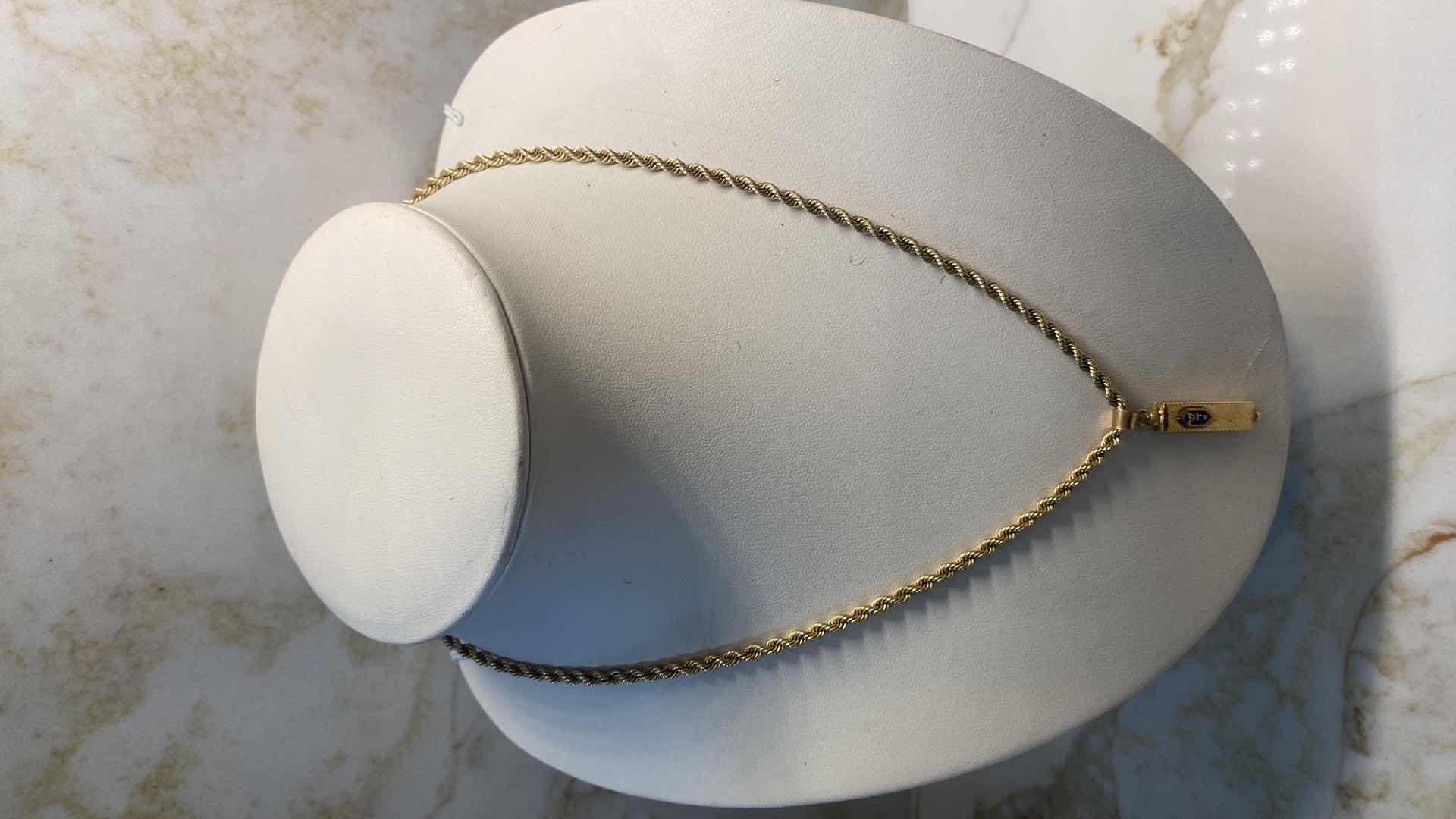 Photo 2 of UNMARKED 18” SILVER CHAIN (gold color) 9.9 GRAMS WITH PENDANT