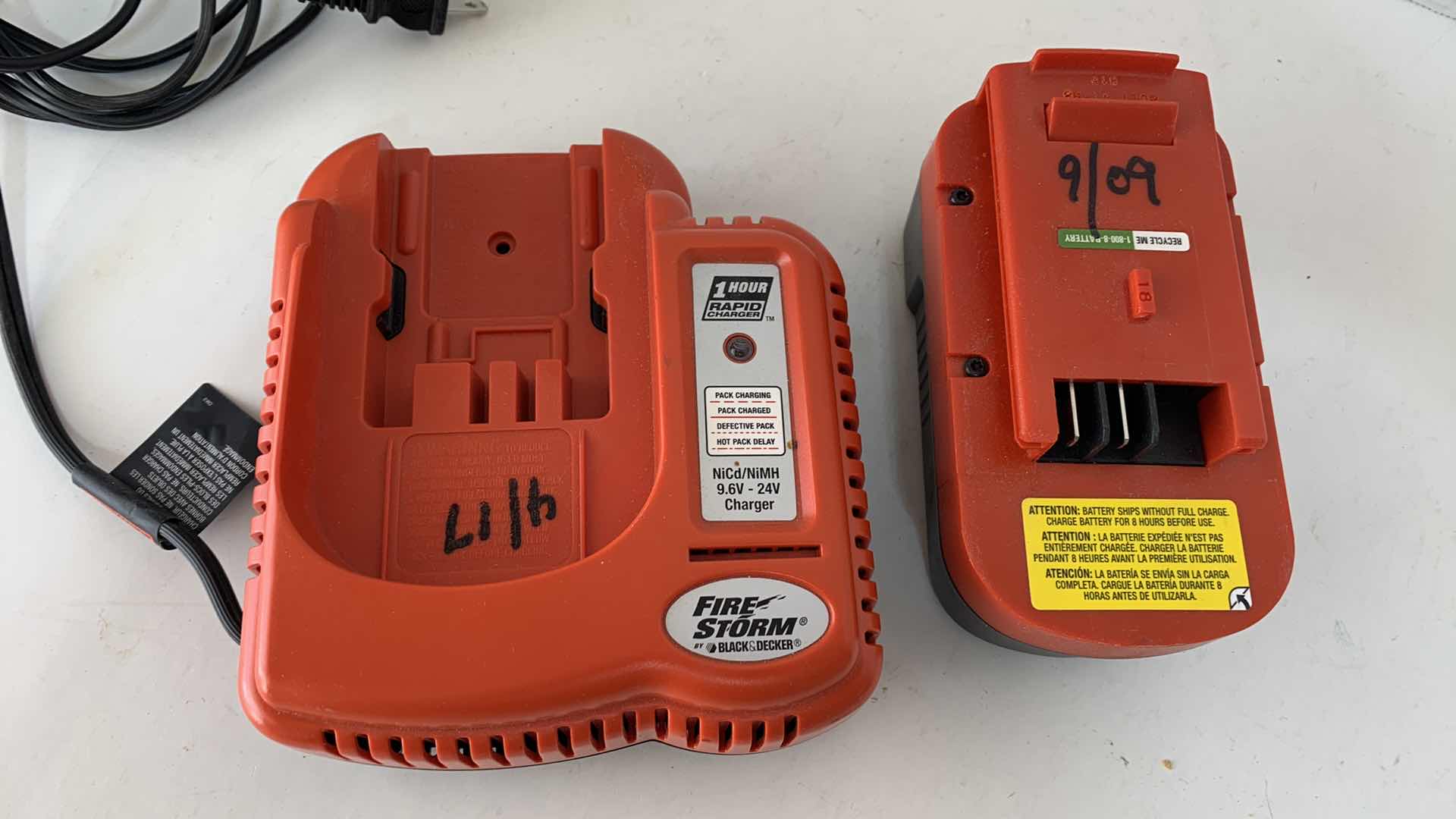 Photo 2 of BLACK AND DECKER 18V BATTERY AND CHARGER