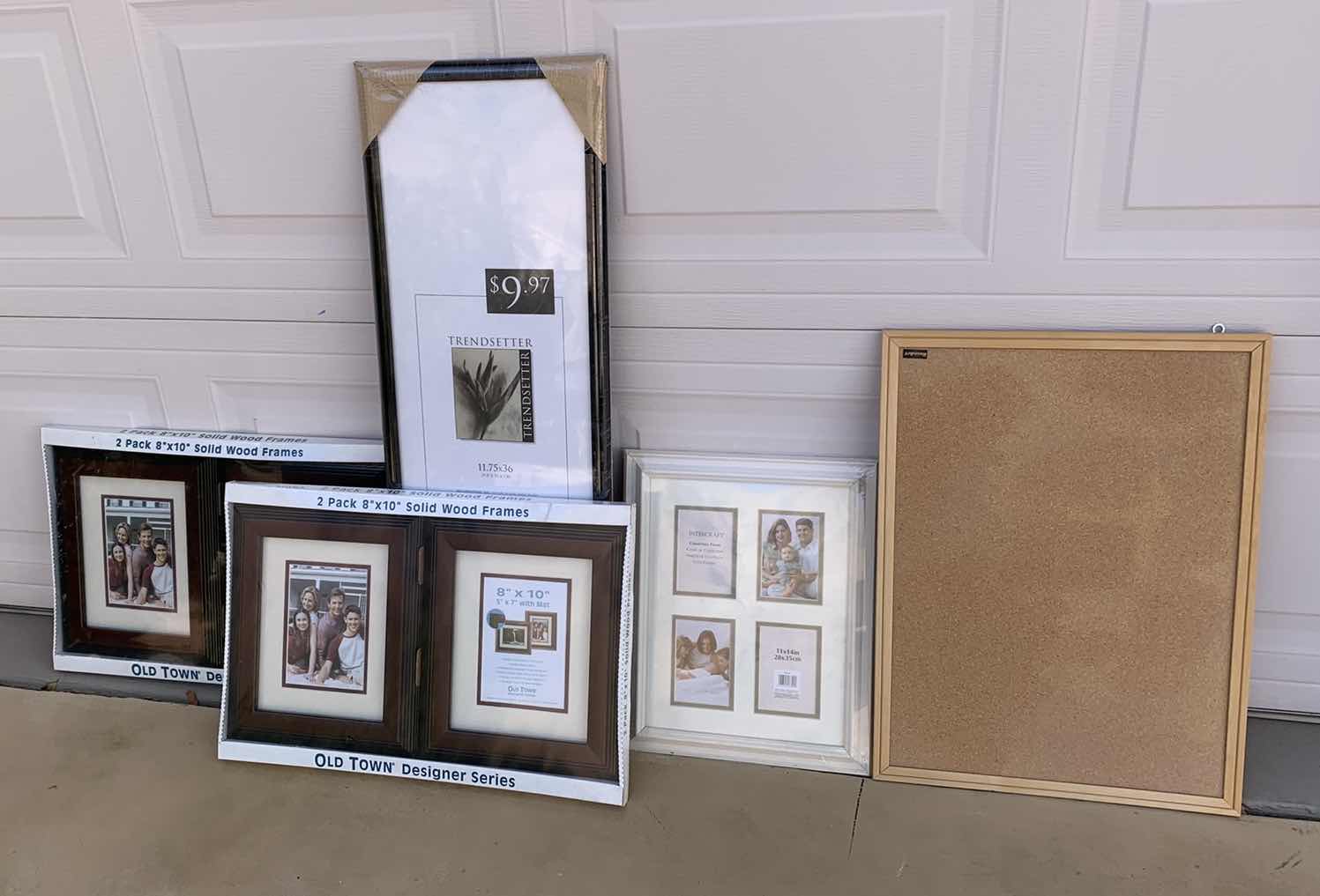 Photo 1 of 4-PICTURE FRAMES AND A CORK BOARD