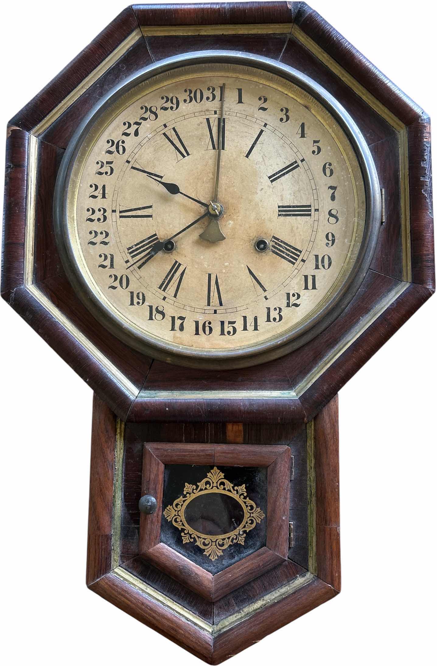 Photo 1 of ANTIQUE WATERBURY CLOCK  c. 1900 14“ x H22“.