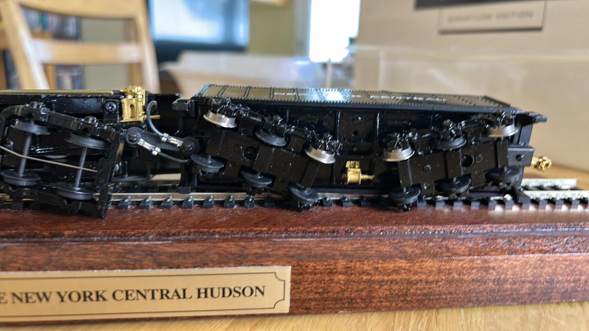 Photo 1 of NEW YORK CENTRAL TRAIN AND TRACK IN DISPLAY CASE ( The model train a New York Central 5414 O Scale Brass Hudson Steam Locomotive and Tender)