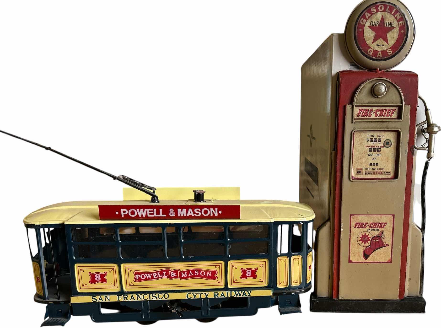 Photo 1 of TIN POWELL & MASON SAN FRANCISCO CYTY RAILWAY CABLE CAR REPLICA AND TIN FIRE CHIEF GASOLINE PUMP (CABLE CAR 13” x H5 1/2”)