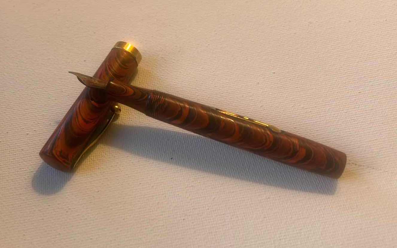 Photo 1 of VINTAGE WATERMAN FOUNTAIN PEN LIKELY A “Red Ripple"