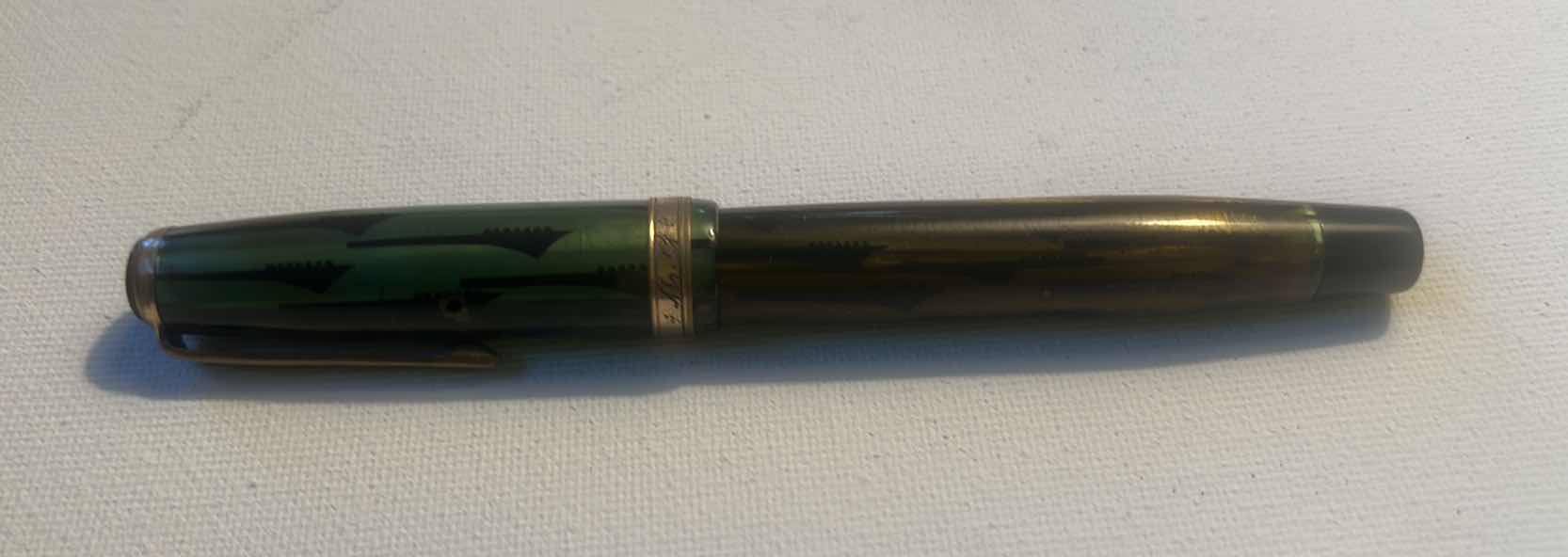 Photo 1 of PARKER PARKETTE FOUNTAIL PEN IN GREEN AND BLACK MARBLED FINISH.