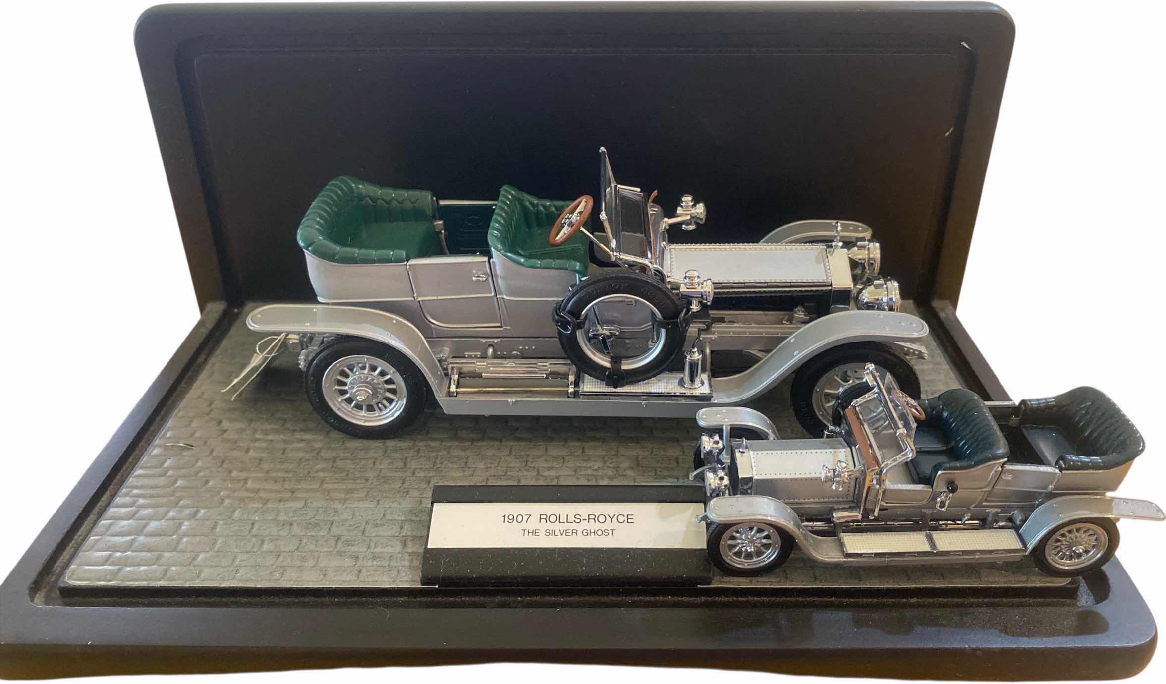 Photo 1 of FRANKLIN MINT PRECISION MODEL 1907 ROLLS RIYCE THE SILVER GHOST LENGTH 7 1/2” IN DISPLAY CASE WITH 2ND CAR 4 1/4”