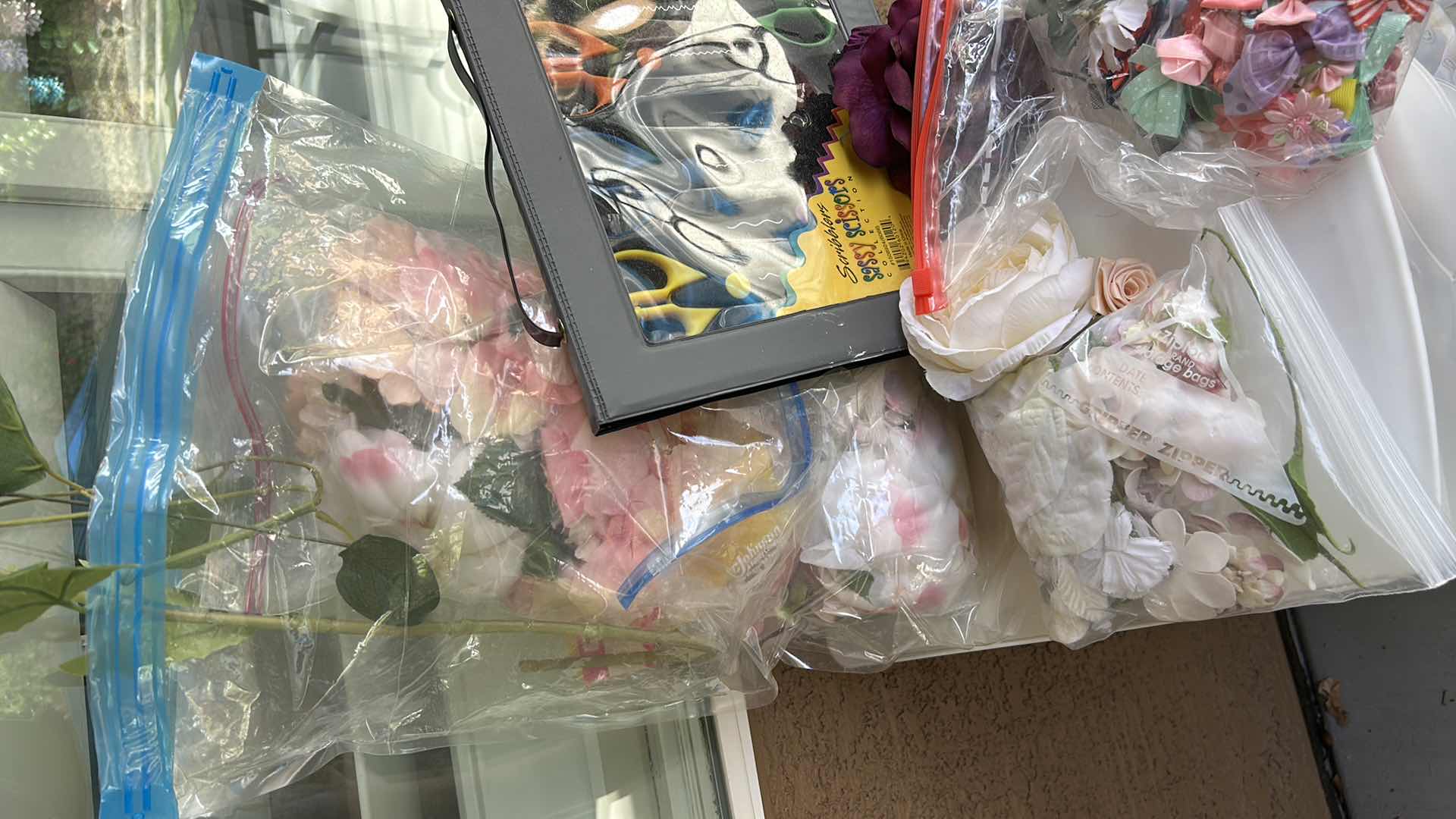 Photo 1 of ROLLED STORAGE WITH CRAFTING SUPPLIES, FAUX FLOWERS AND FABRIC