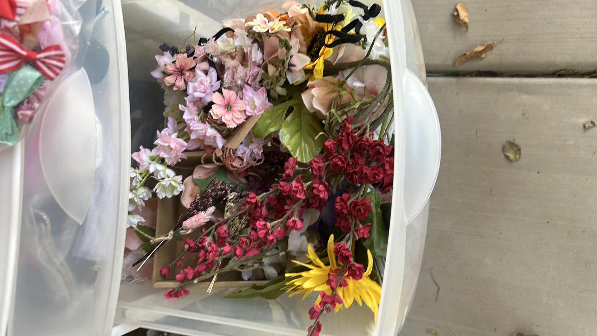 Photo 1 of ROLLED STORAGE WITH CRAFTING SUPPLIES, FAUX FLOWERS AND FABRIC