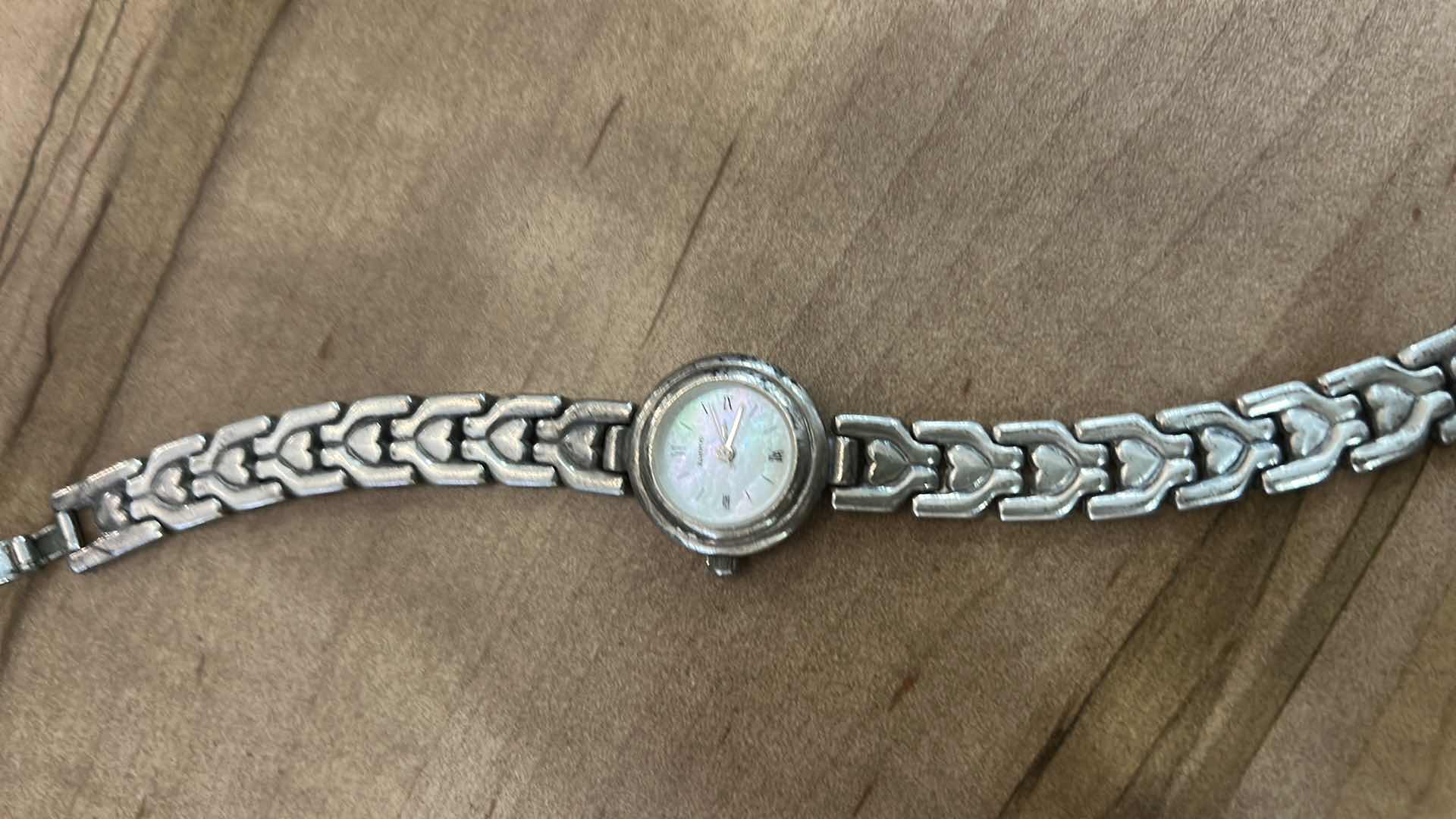 Photo 1 of VINTAGE STAMPED .925 STERLING SILVER WATCH 43.39 grams which includes mechanical parts