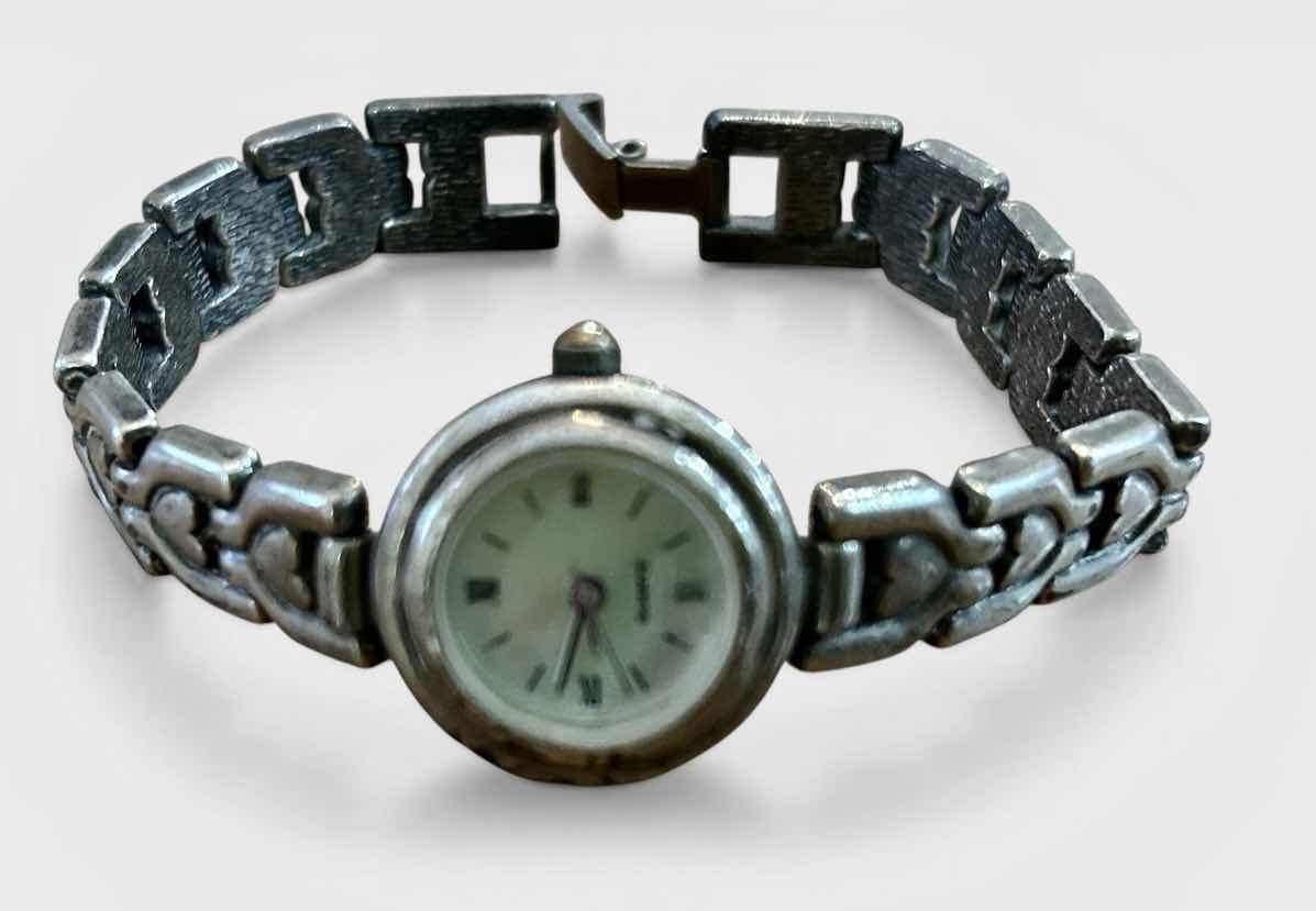 Photo 1 of VINTAGE STAMPED .925 STERLING SILVER WATCH 43.39 grams which includes mechanical parts