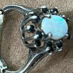 Photo 1 of STAMPED .925 STERLING SILVER RING WITH OPAL AND RED GEMSTONES EST SIZE 6