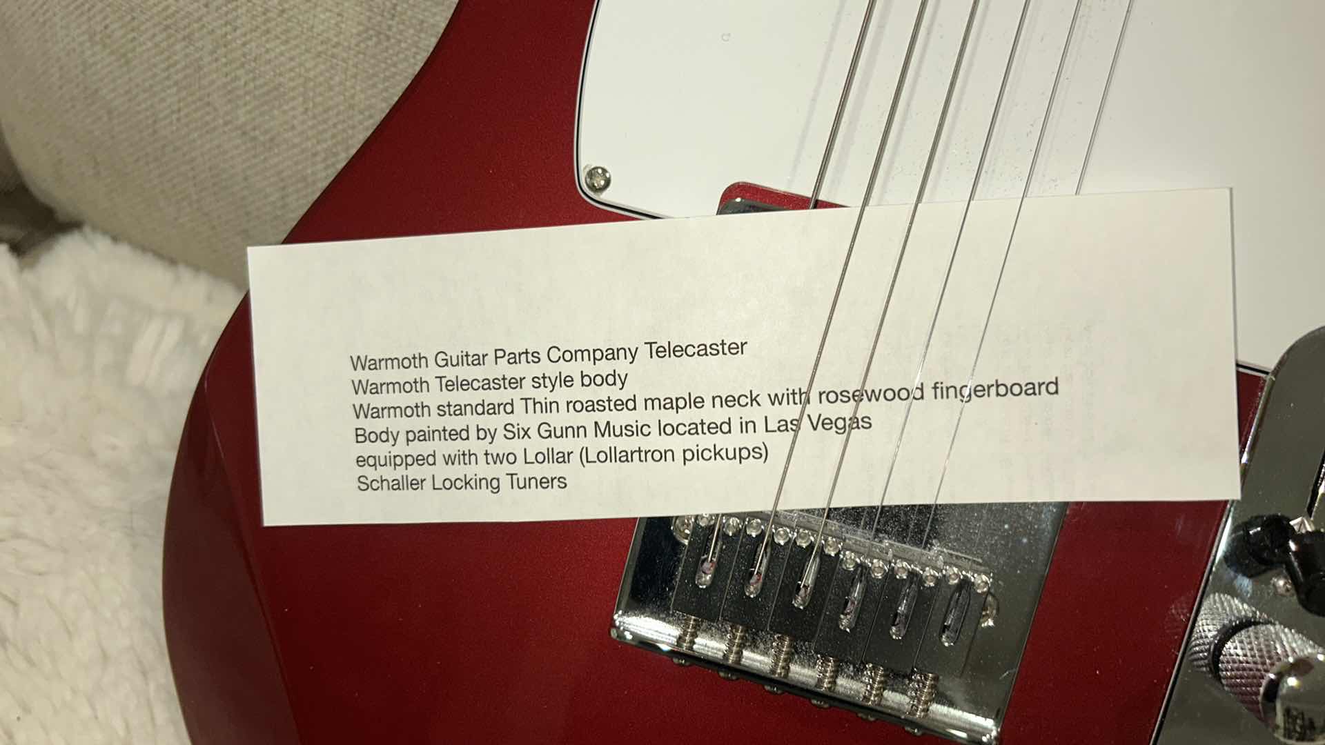 Photo 1 of WARMOTH GUITAR PARTS COMPANY TELECASTER
WARMOTH TELECASTER STYLE BODY
WARMOTH STANDARD THIN ROASTED MAPLE NECK WITH ROSEWOOD FINGERBOARD
BODY PAINTED BY SIX GUNN MUSIC LOCATED IN LAS VEGAS EQUIPPED WITH TWO LOLLAR (LOLLARTRON PICKUPS)
