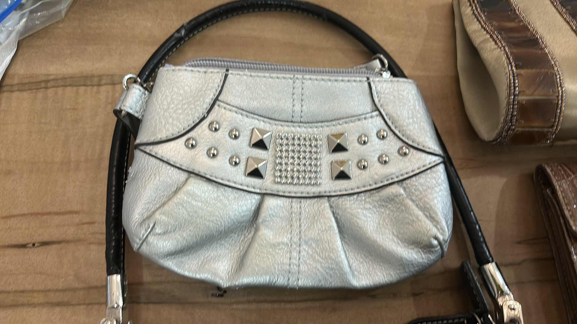 Photo 1 of CLUTCH PURSES AND WALLETS