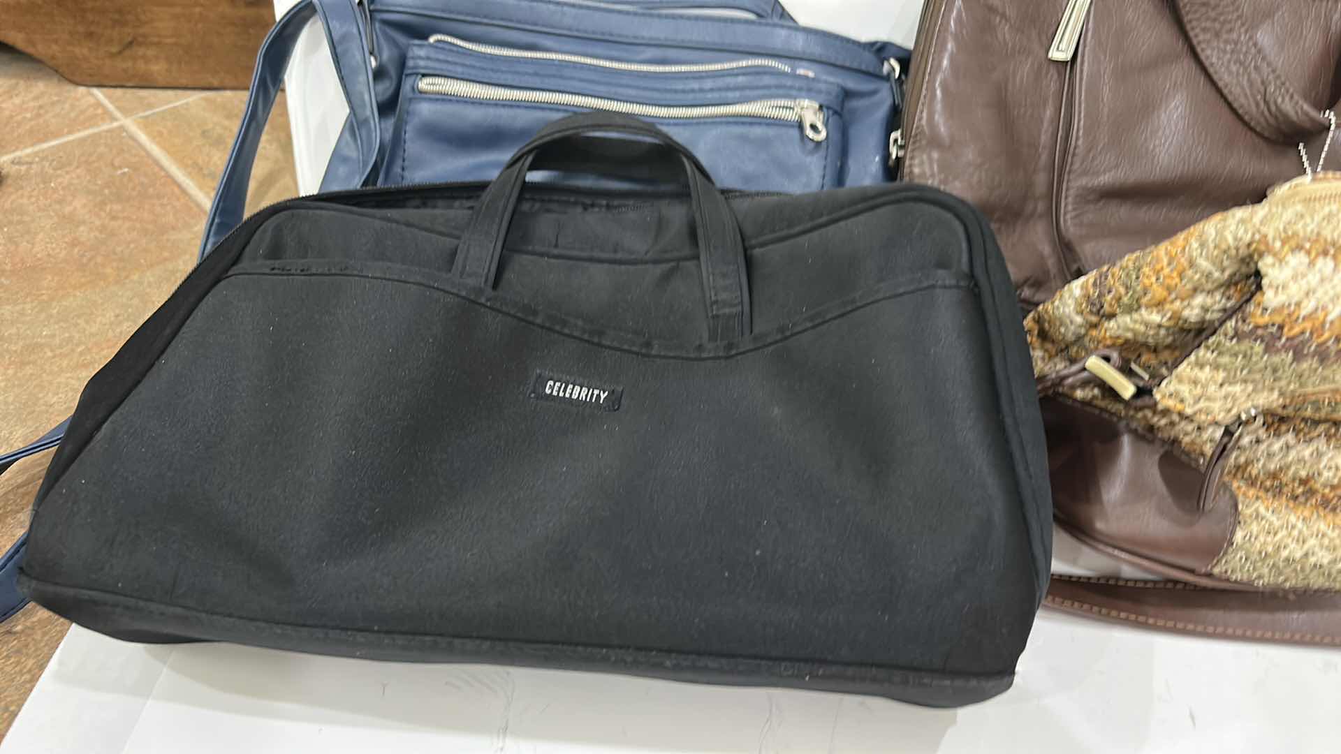 Photo 1 of SIX WOMEN’S HANDBAGS
