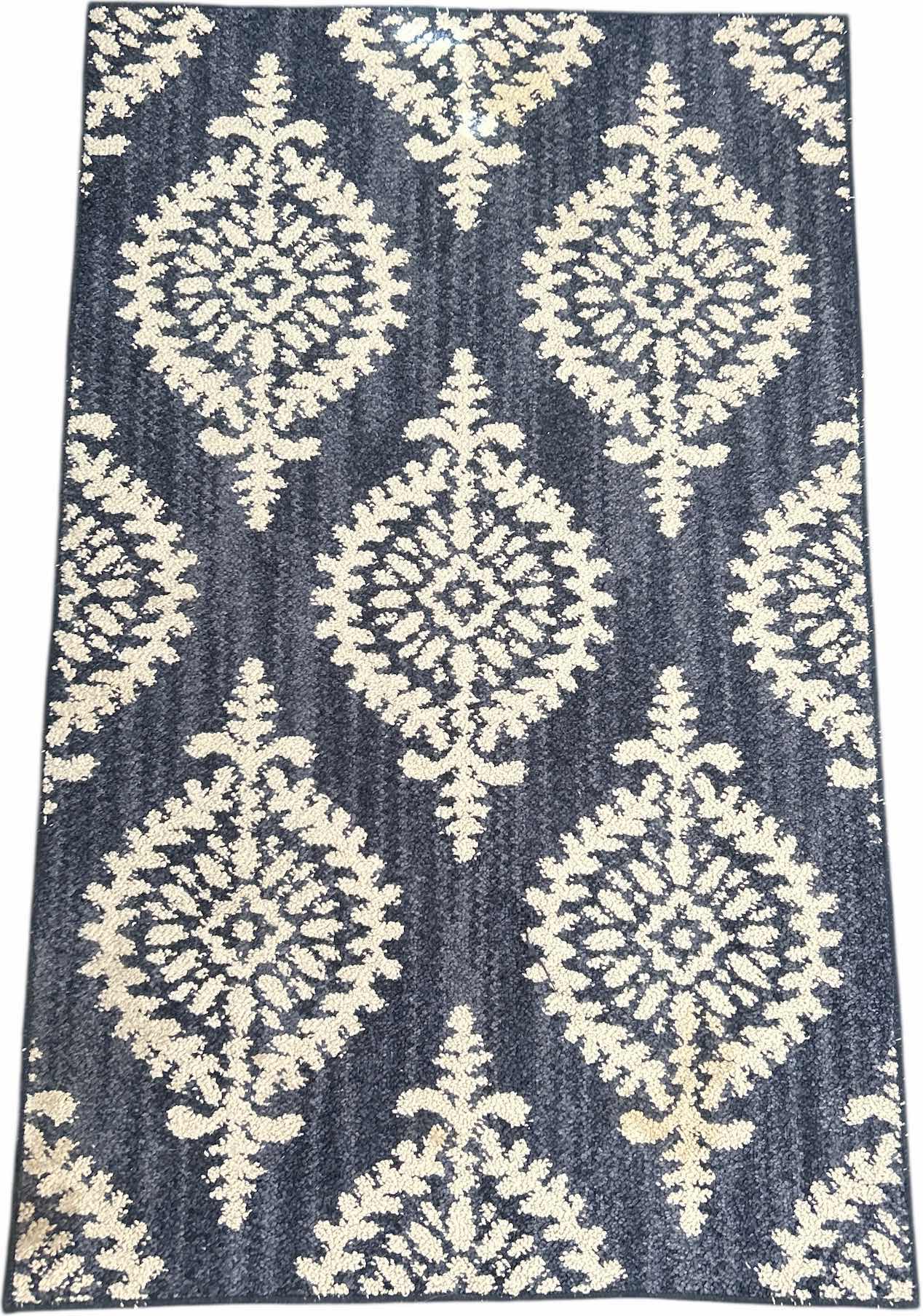 Photo 1 of SMALL AREA RUG 30” x 47 1/2”