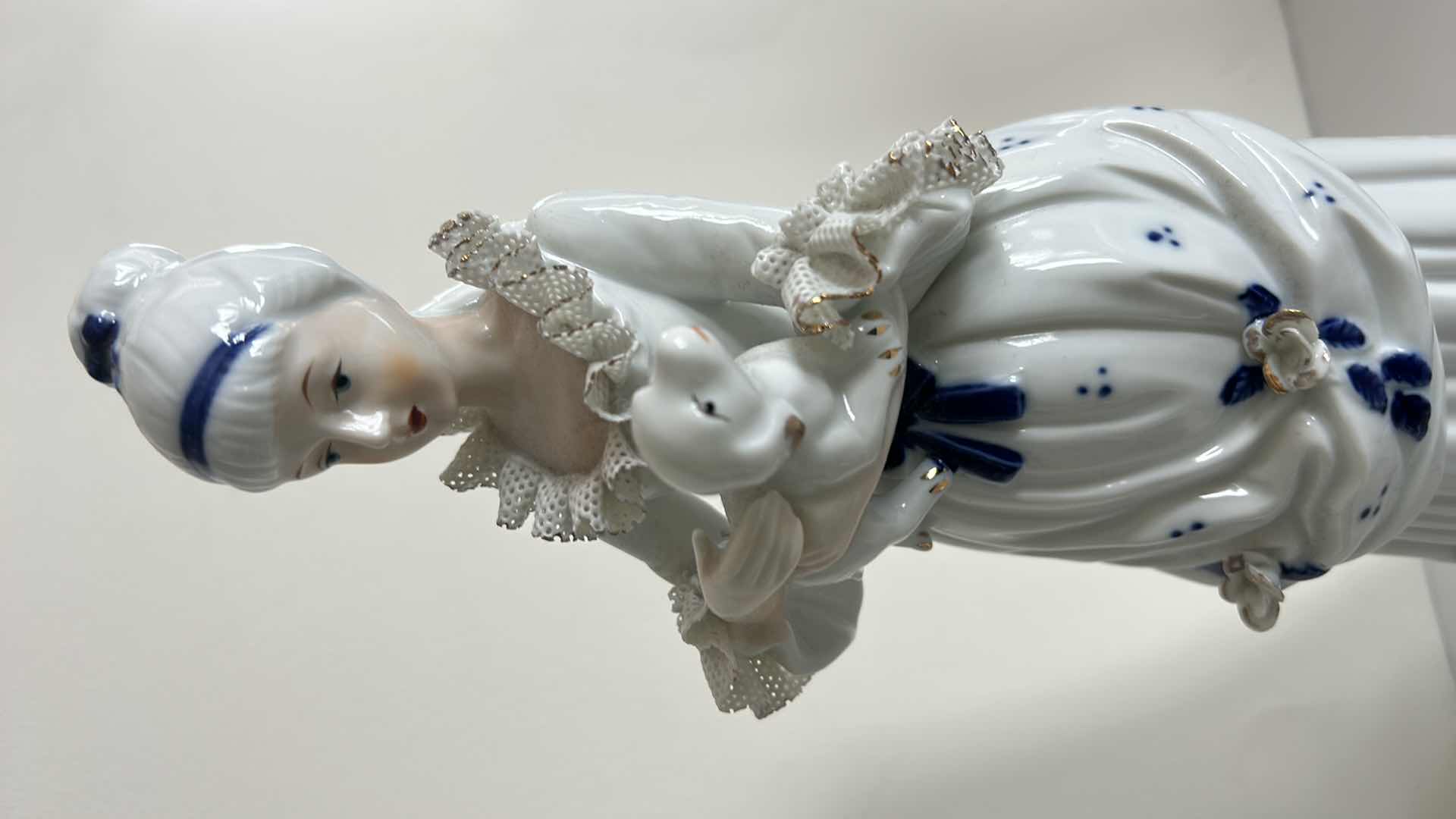 Photo 1 of 2 BLUE AND WHITE PORCELAIN FIGURINES H14.5”