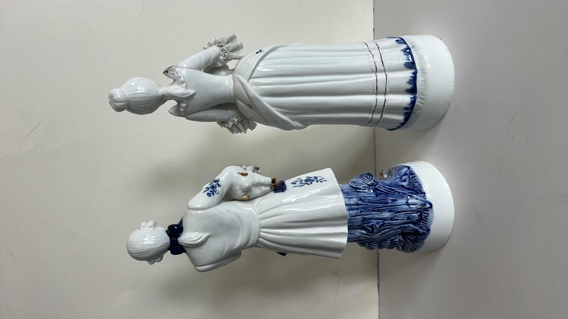 Photo 1 of 2 BLUE AND WHITE PORCELAIN FIGURINES H14.5”