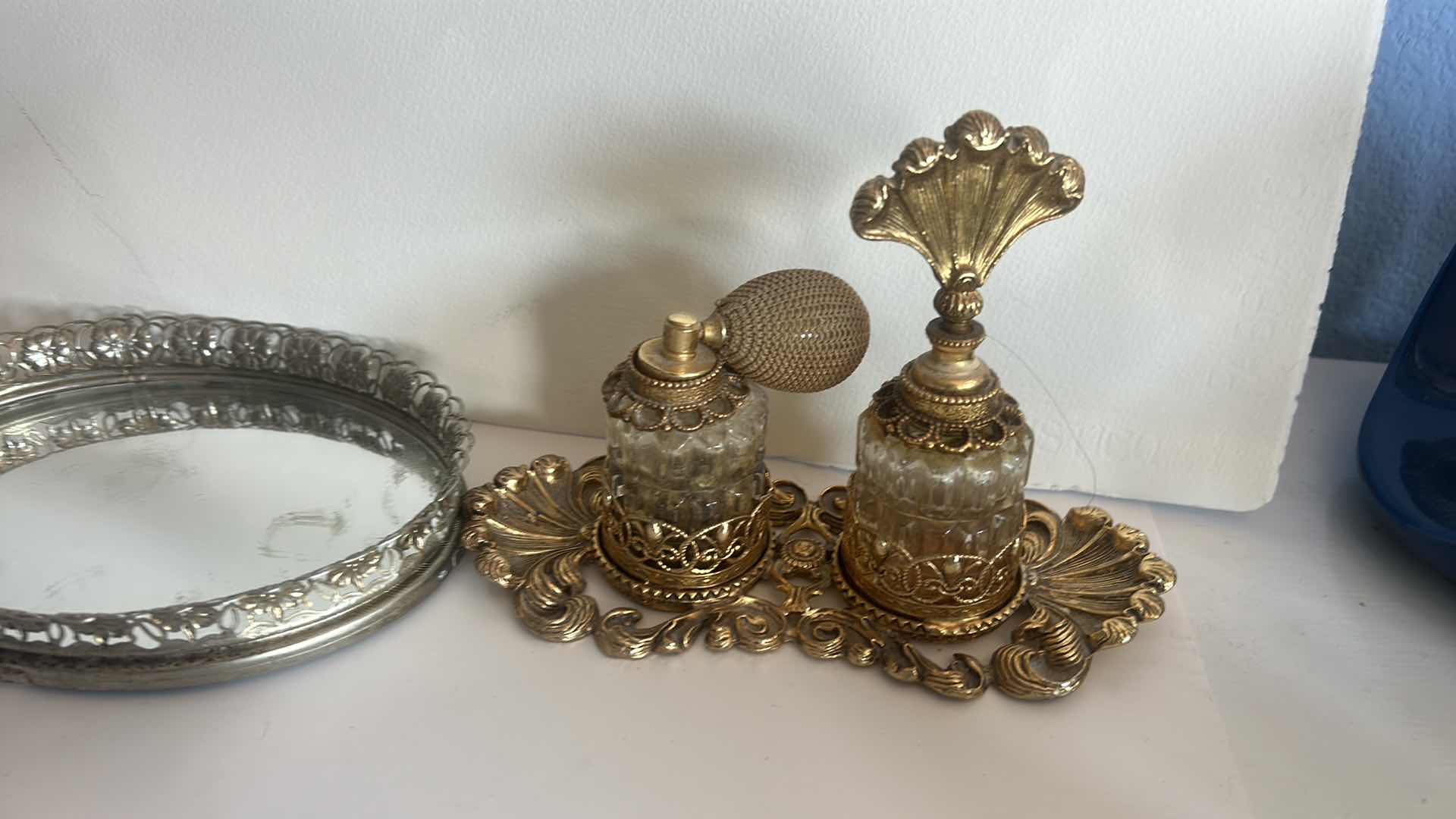 Photo 1 of VINTAGE COLLECTION- PERFUME BOTTLES, NUMBERED MUSIC BOX “WHISPERING WINGS” AND TRAY