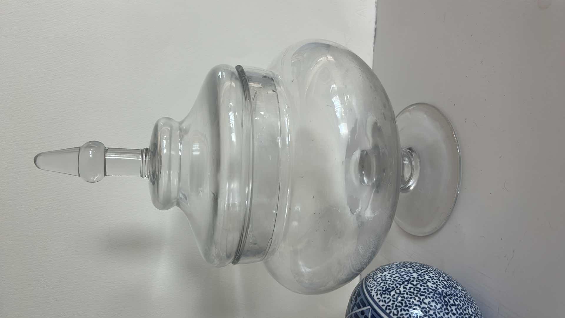 Photo 1 of GLASS LIDDED JAR H15” AND 3 DECORATIVE 5” PORCELAIN ORBS
