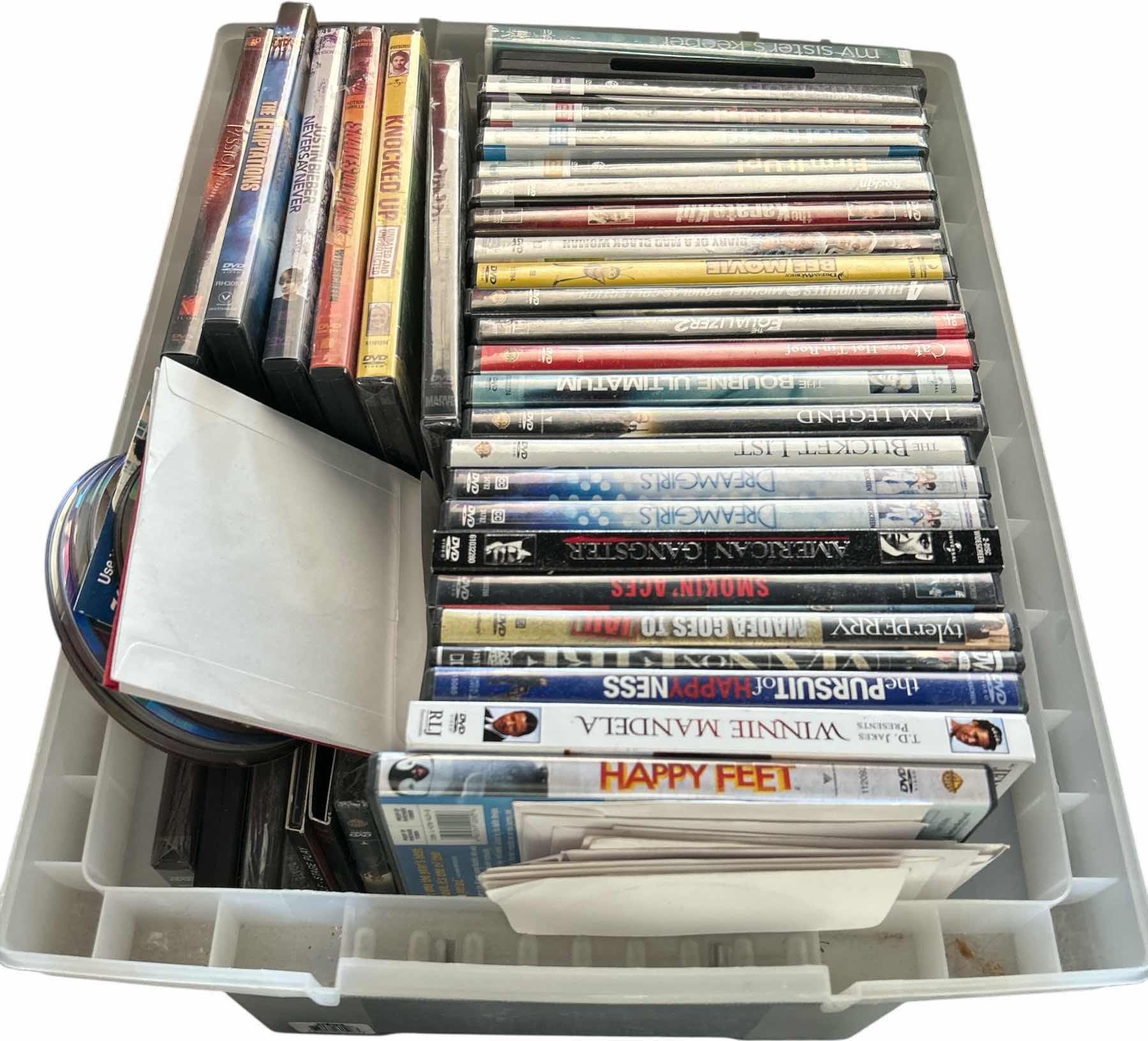 Photo 1 of TOTE FULL OF DVDS