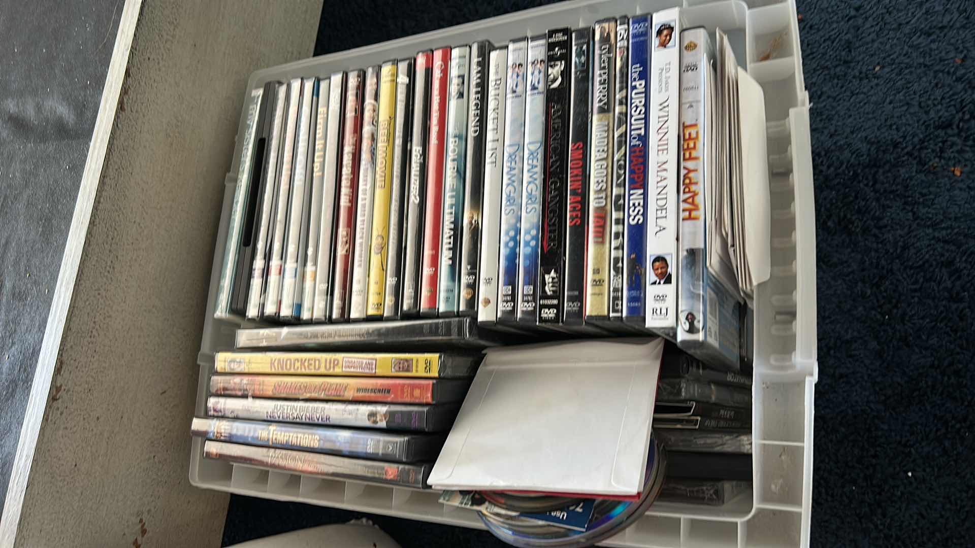 Photo 1 of TOTE FULL OF DVDS