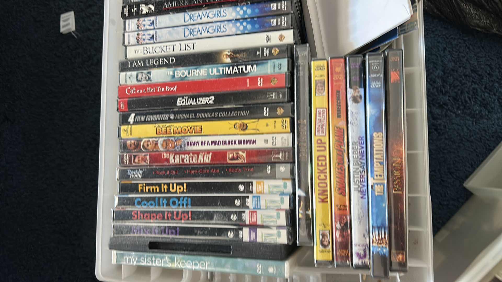 Photo 1 of TOTE FULL OF DVDS