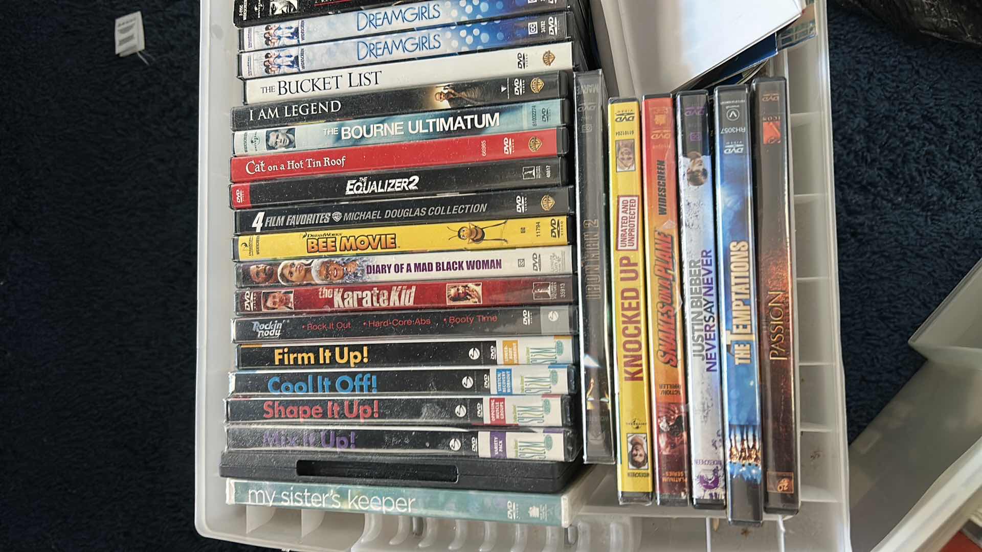 Photo 1 of TOTE FULL OF DVDS