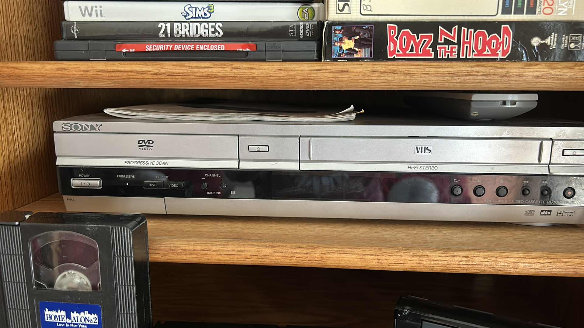 Photo 1 of SONY DVD AND VHS PLAYER WITH TAPES